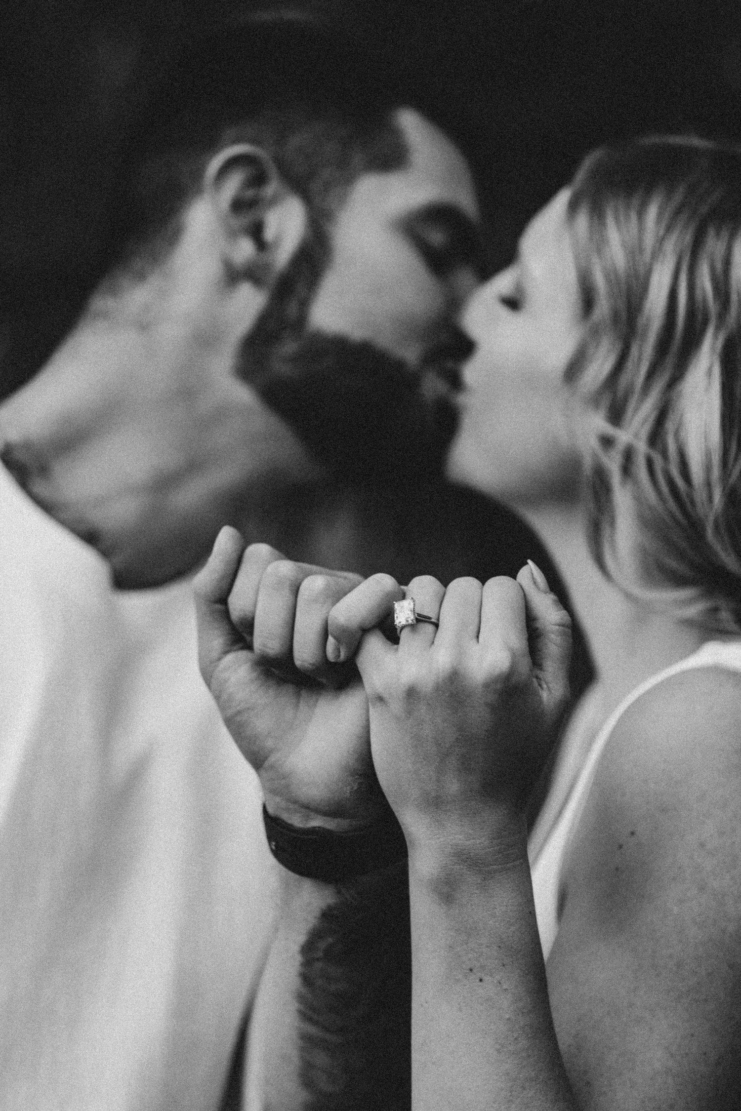 Artistic black and white close-up series showing intimate moments between a couple.