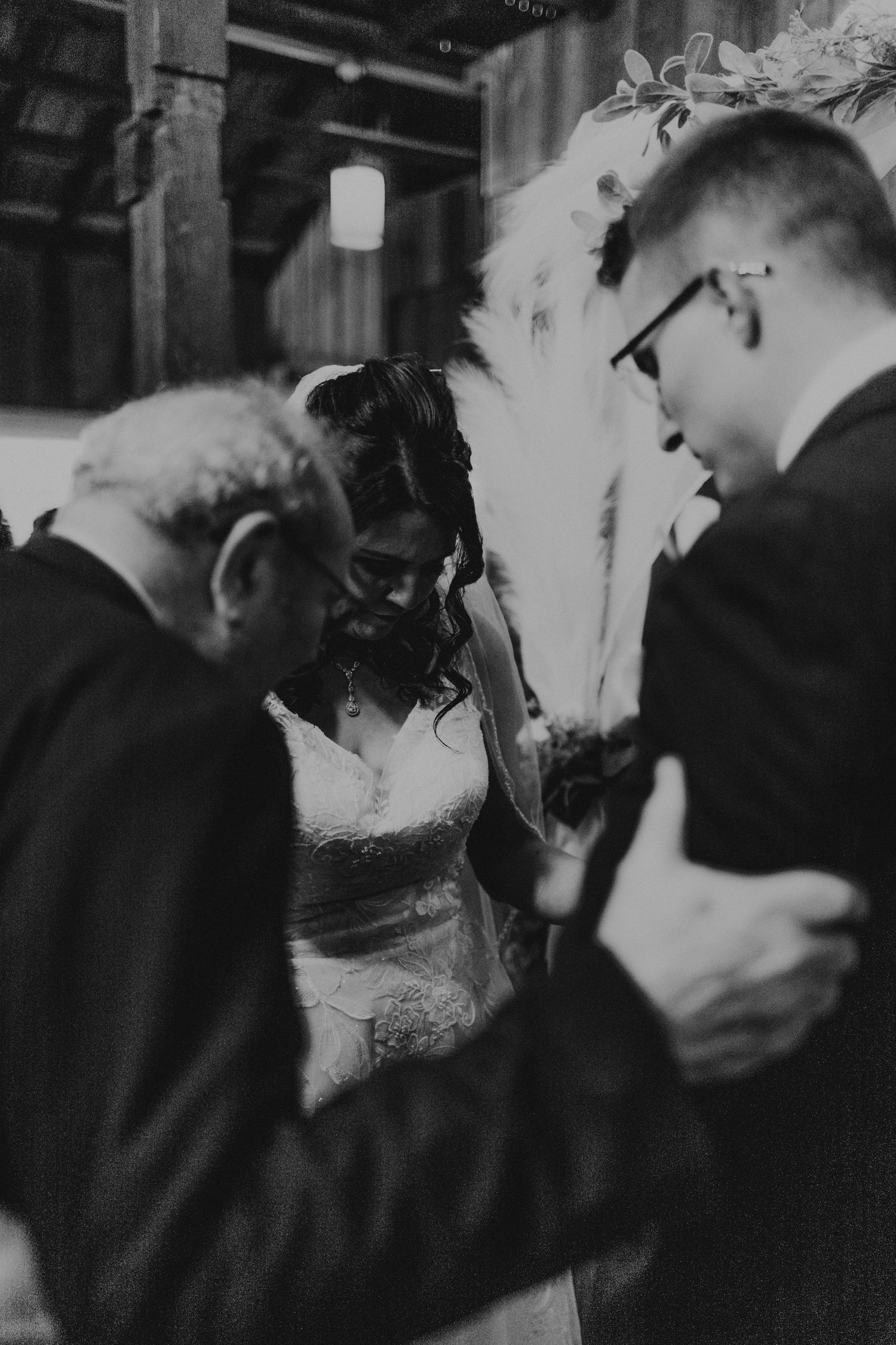 Black and white candid reception moments captured during an intimate wedding celebration.