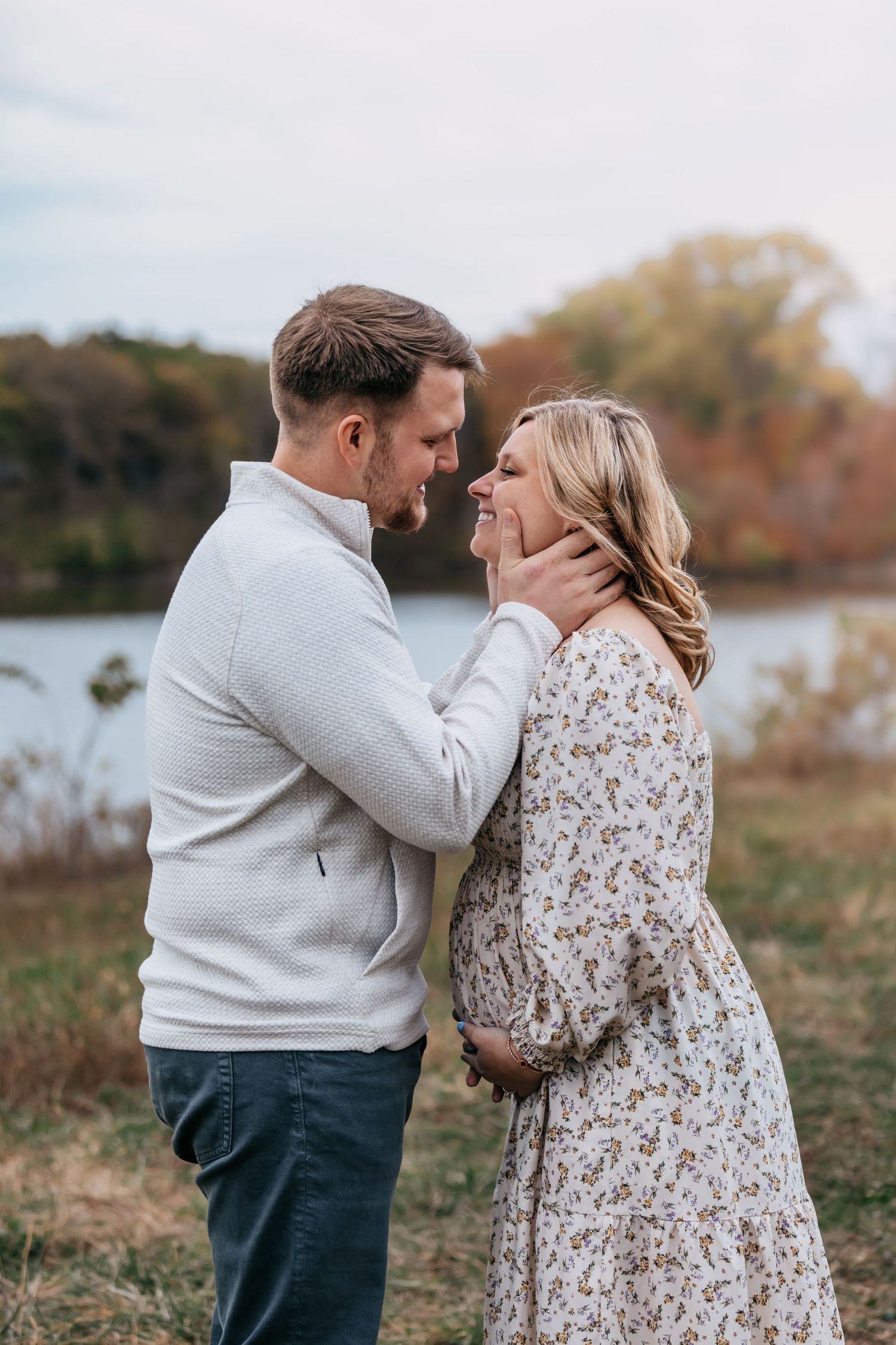 Romantic outdoor couple photos showing intimate moments in autumn setting.