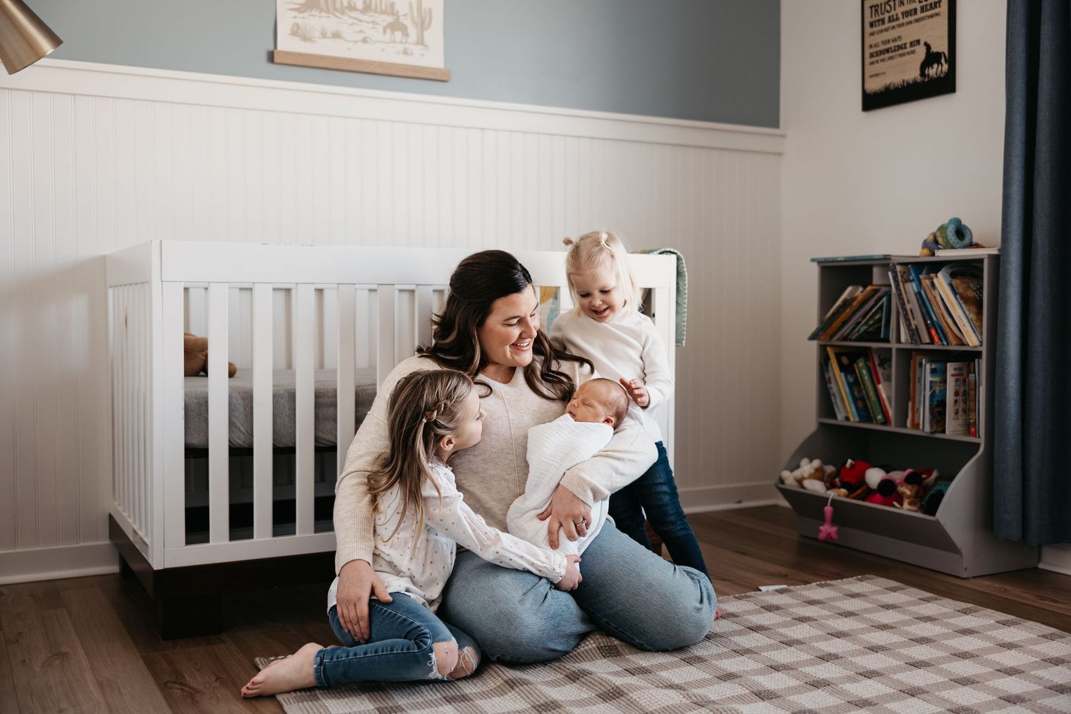Candid family moments captured in a cozy home setting with natural light.