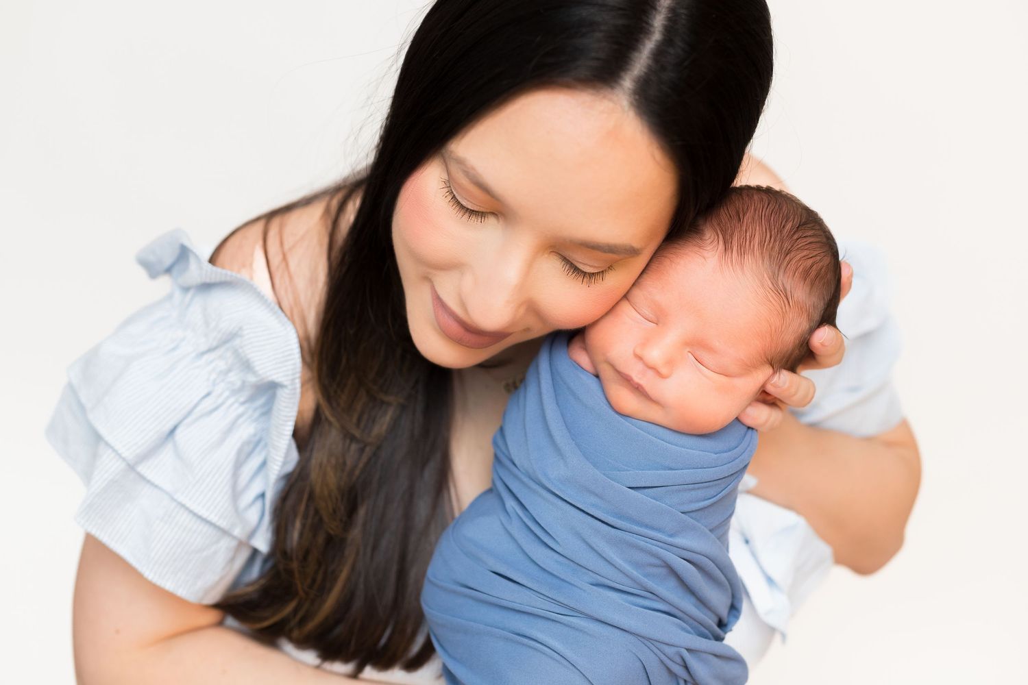Series of tender moments between caregiver and infant against white background.
