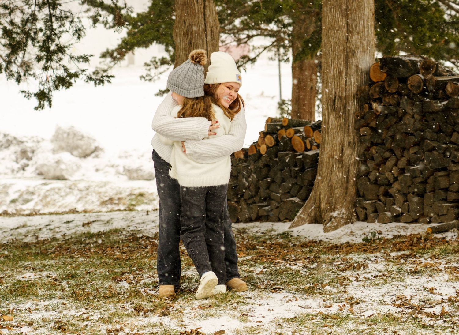 Winter outdoor photoshoot with snow covered trees.