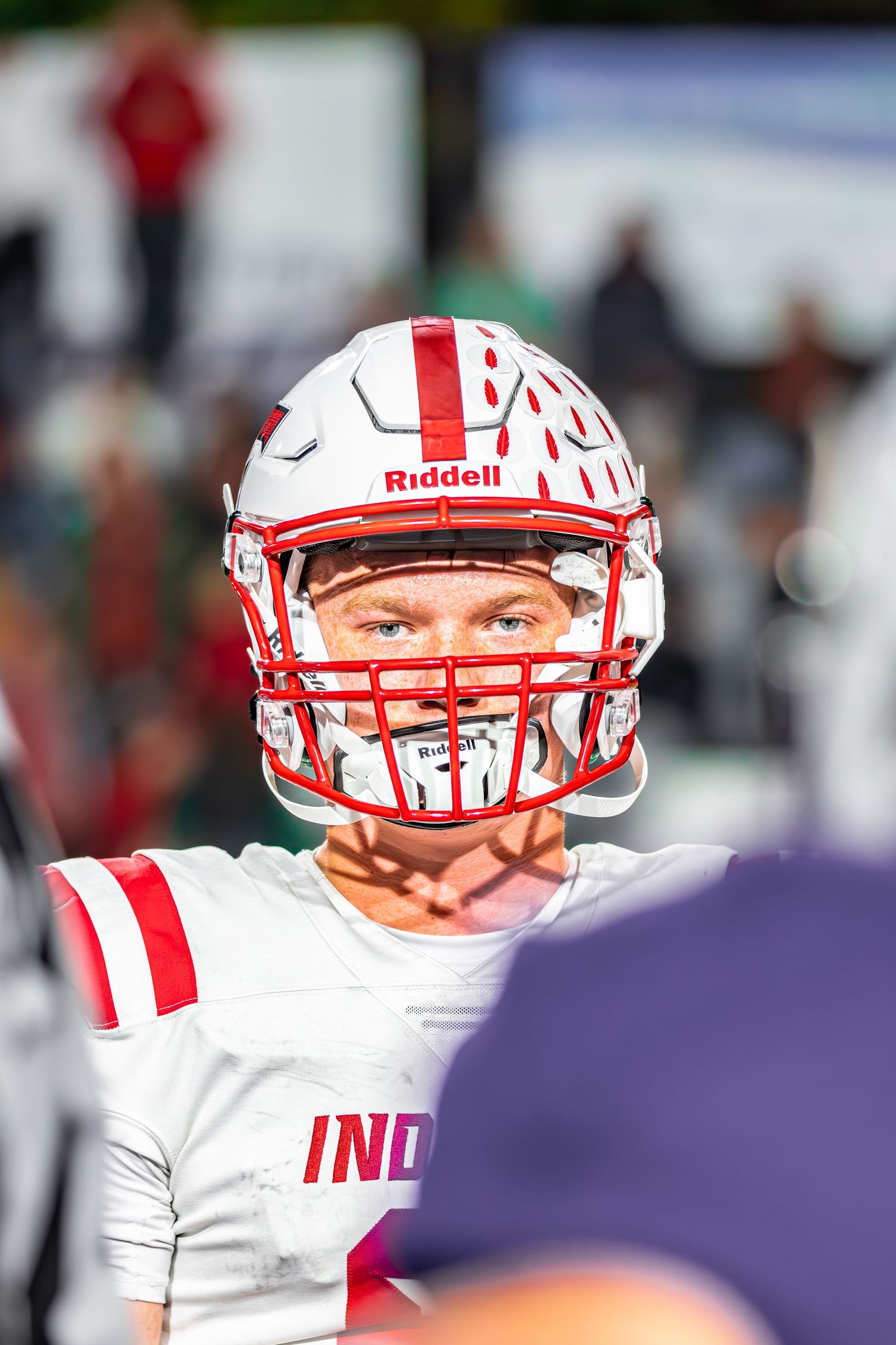 Football player looking straight at camera.