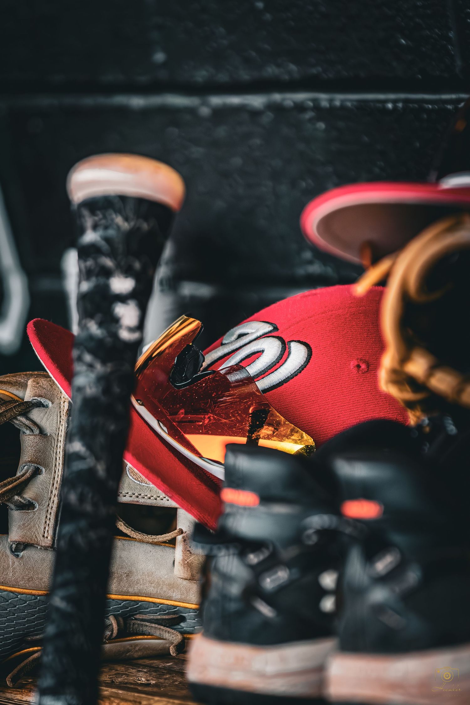 Baseball hat with glove cleats, and bat.