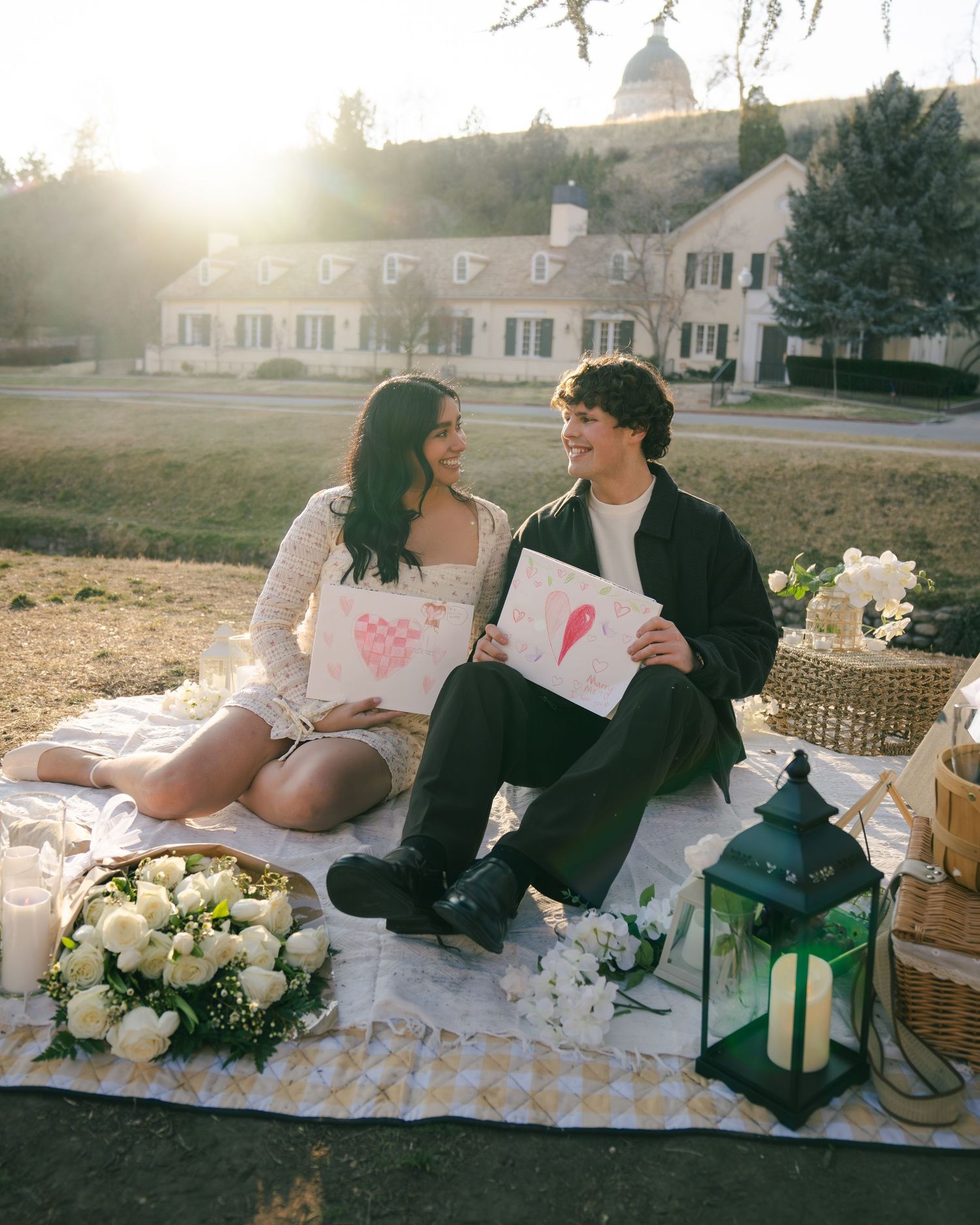 Couples proposal photography session at Memory Grove Park, Salt Lake City with a vibrant sunset.