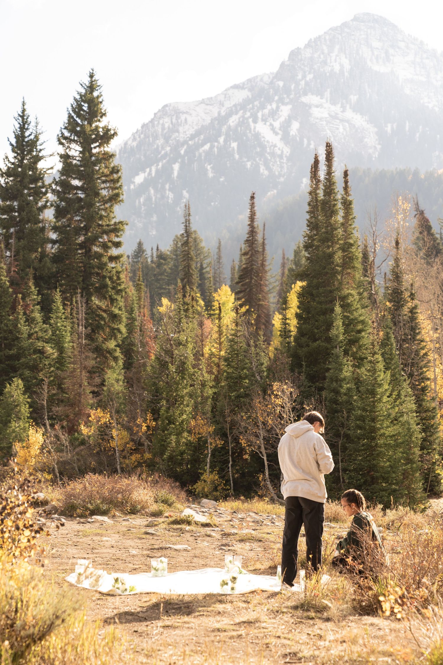 Romantic couples photography in Utah mountains during golden hour