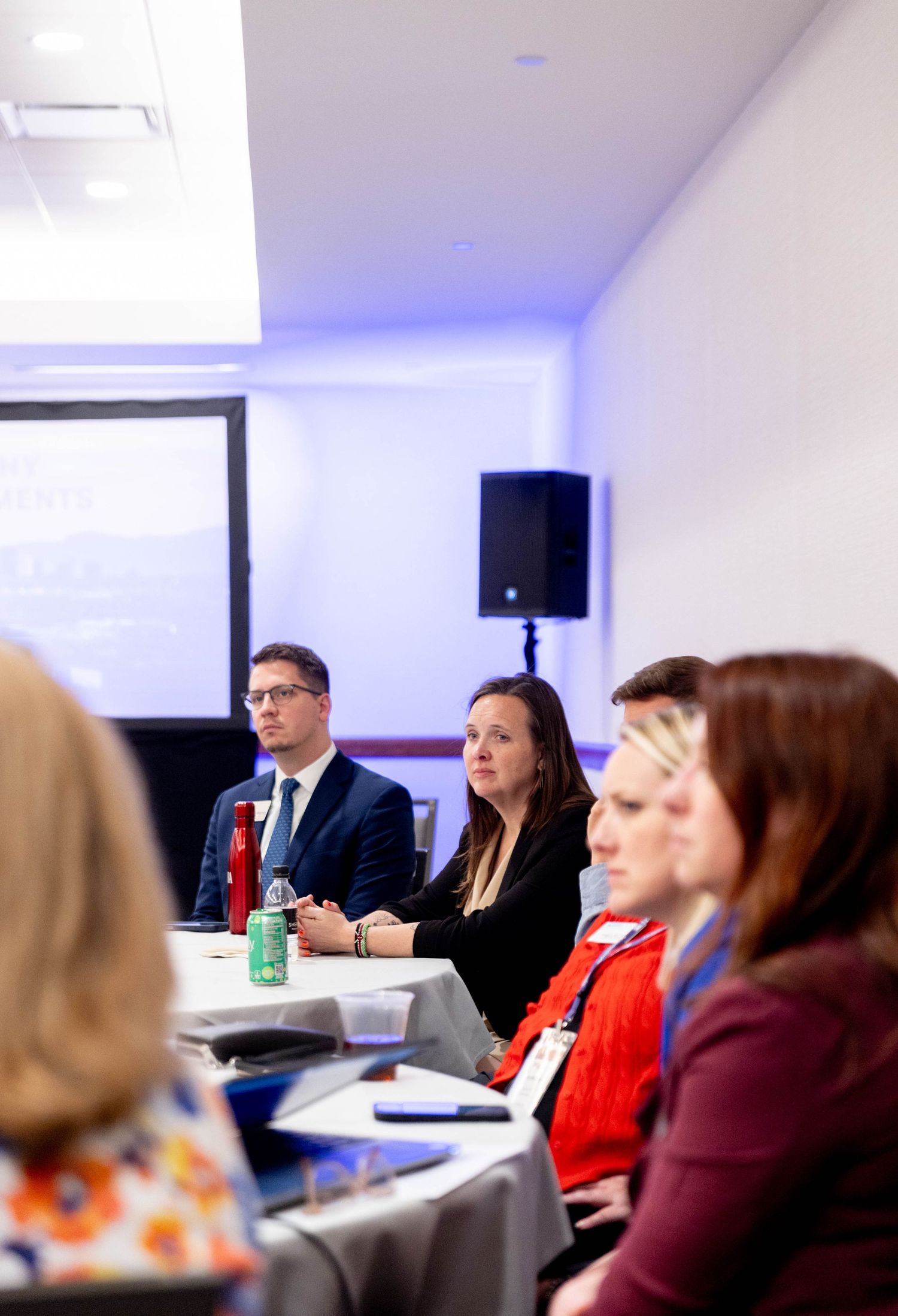 Participants actively collaborating during a workshop session at a corporate seminar.