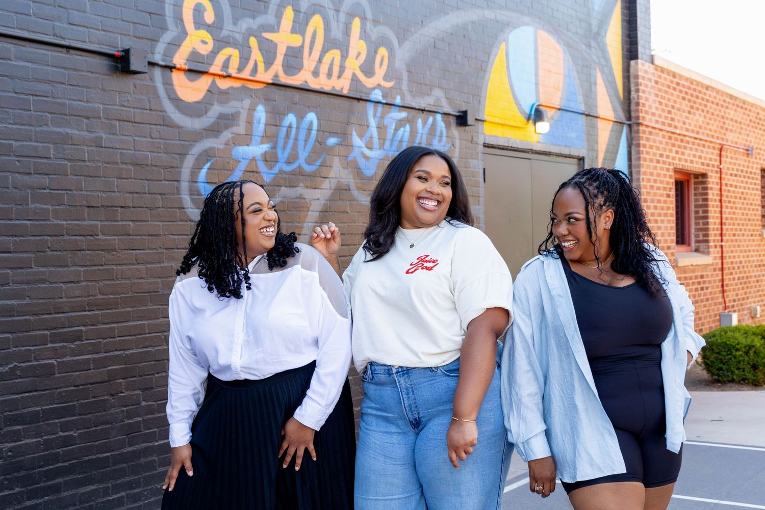 Empowered female entrepreneurs posing confidently for a personal branding shoot.
