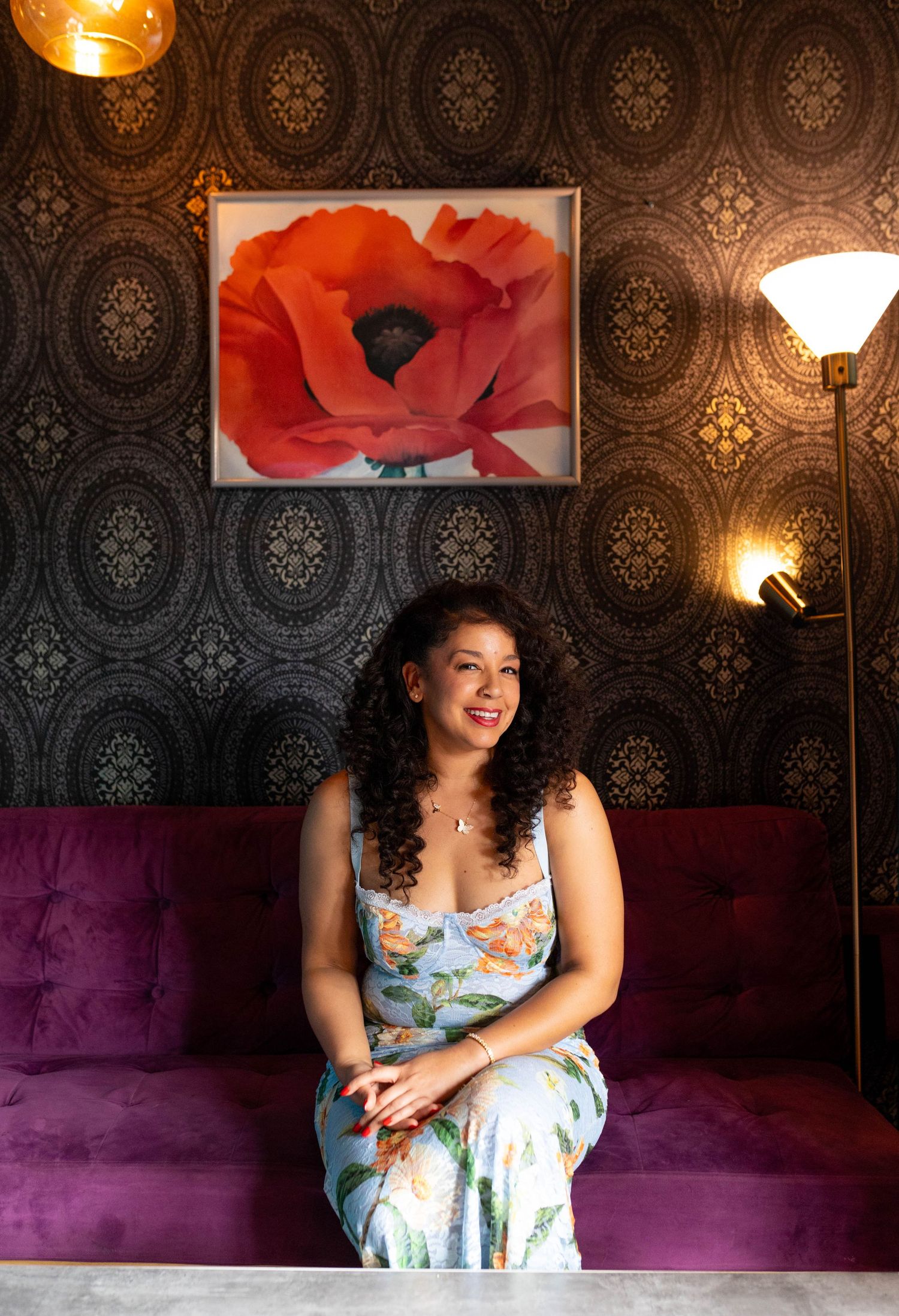 Businesswoman smiling, planning her next big business launch.