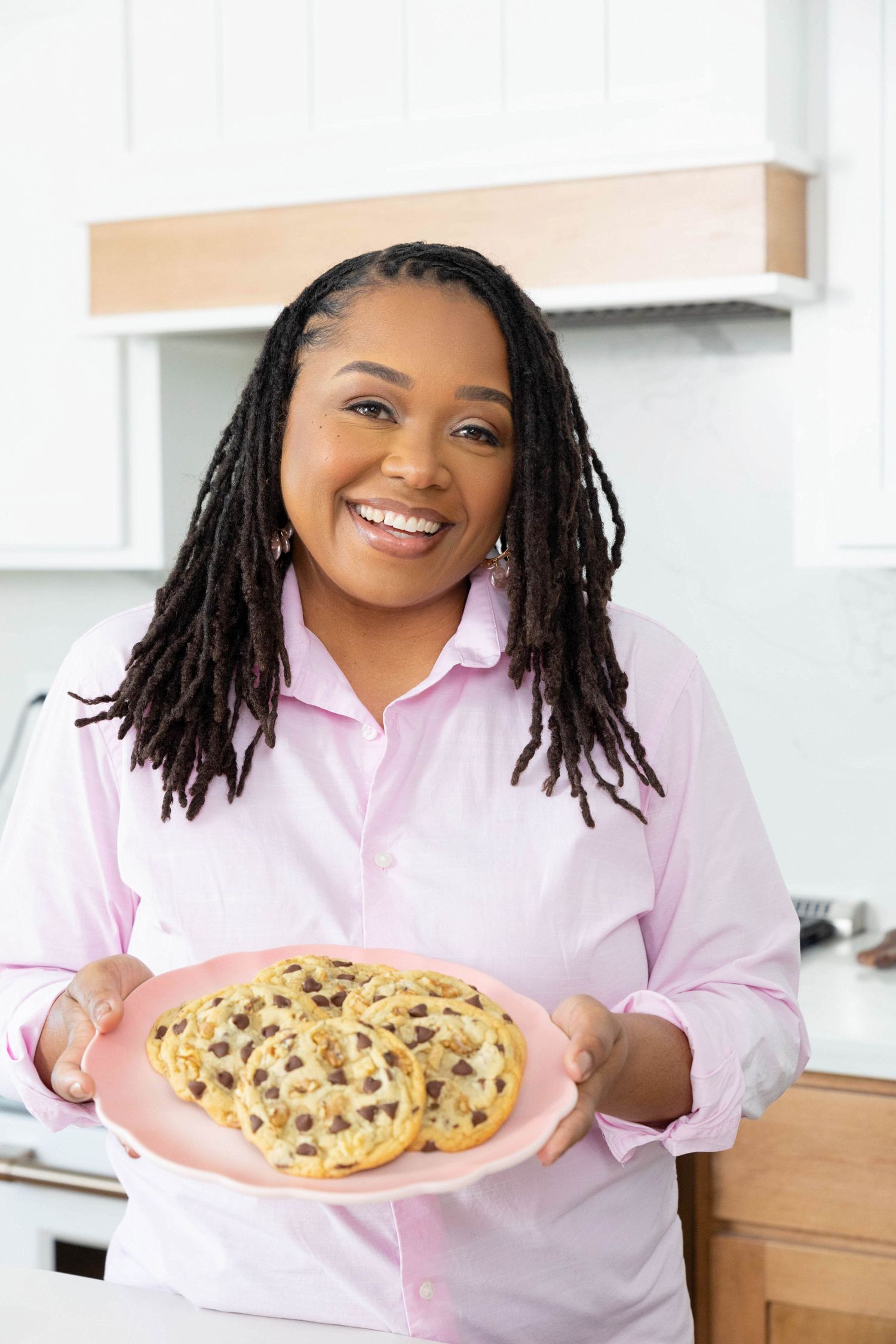 Empowered female entrepreneur posing confidently for a personal branding shoot.