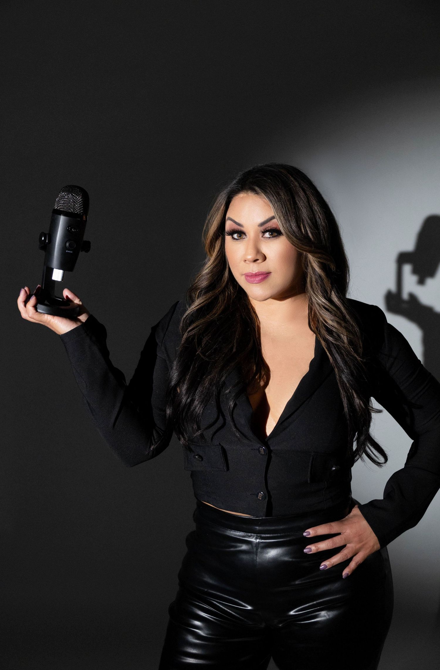 Empowered female entrepreneur posing confidently for a personal branding shoot.