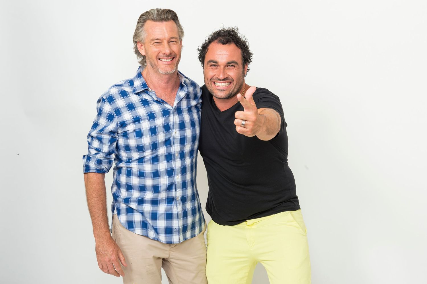 Chef Miguel Maestre and Barry Du Bois posing together against white background in casual attire.