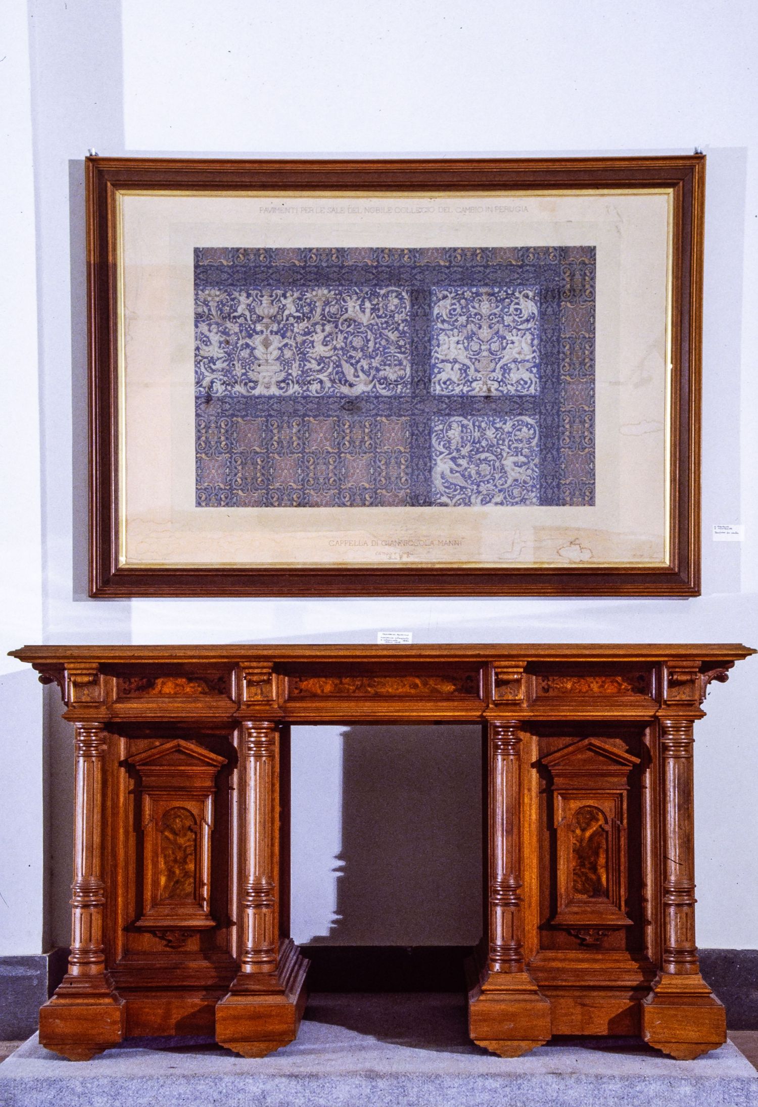 MAI Museo artistico industriale Filippo Palizzi, wooden antique desk with carved details displayed in a museum setting.