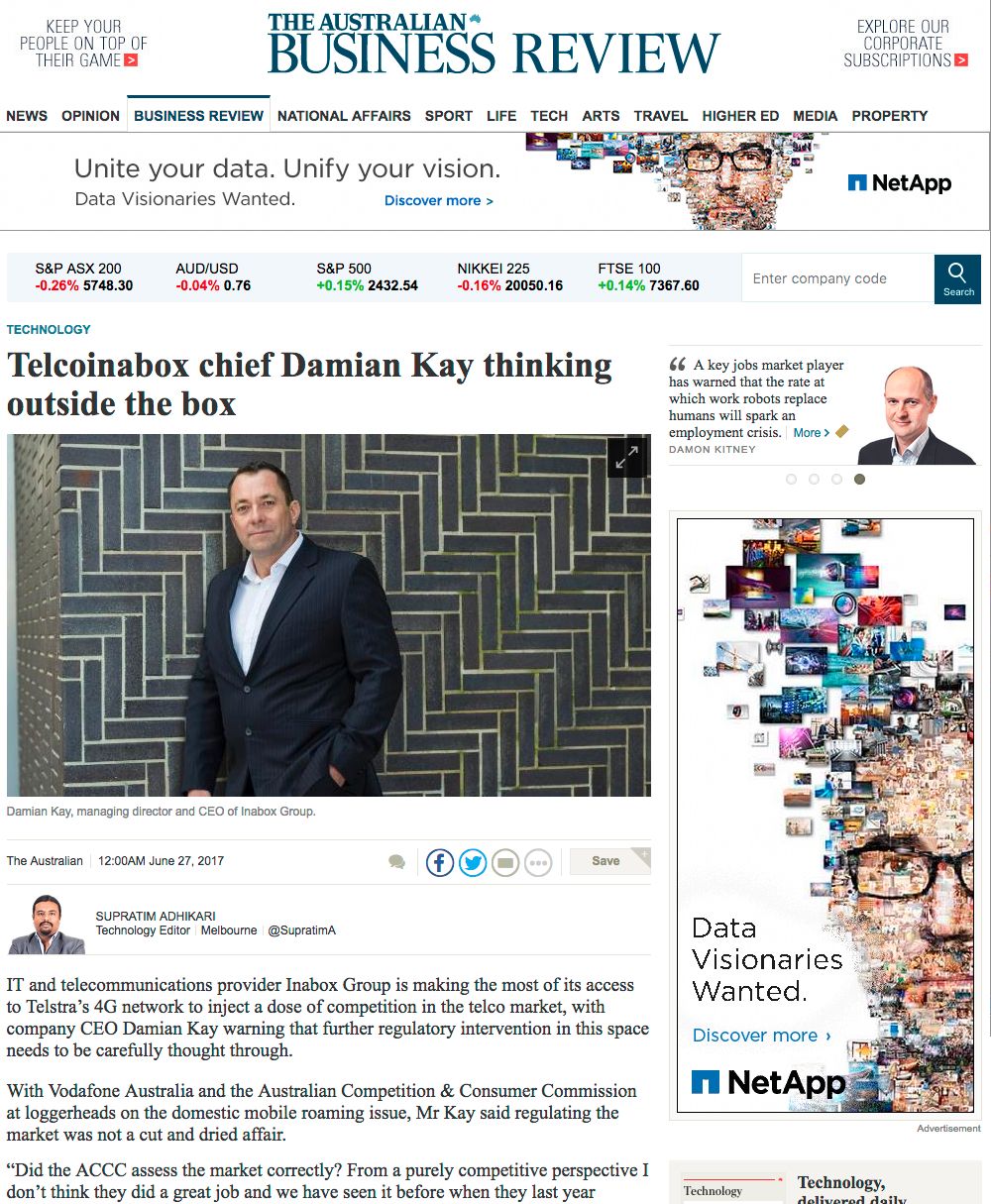 Business website layout showing article headlines and navigation menu.