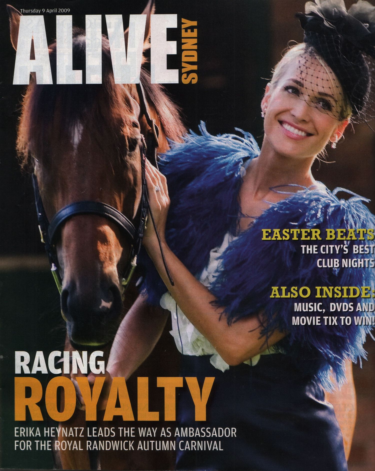 Magazine cover featuring horse racing and carnival themes in vibrant colors.