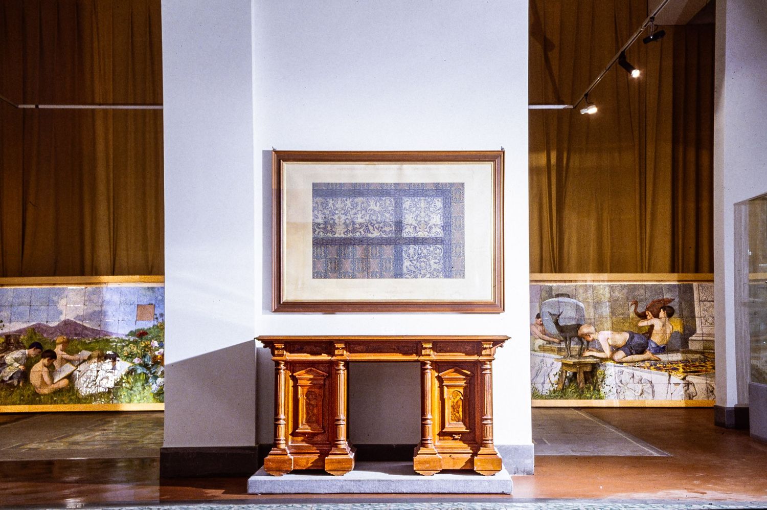 MAI Museo artistico industriale Filippo Palizzi. gallery hallway with decorative tiles and wooden, display cabinets.