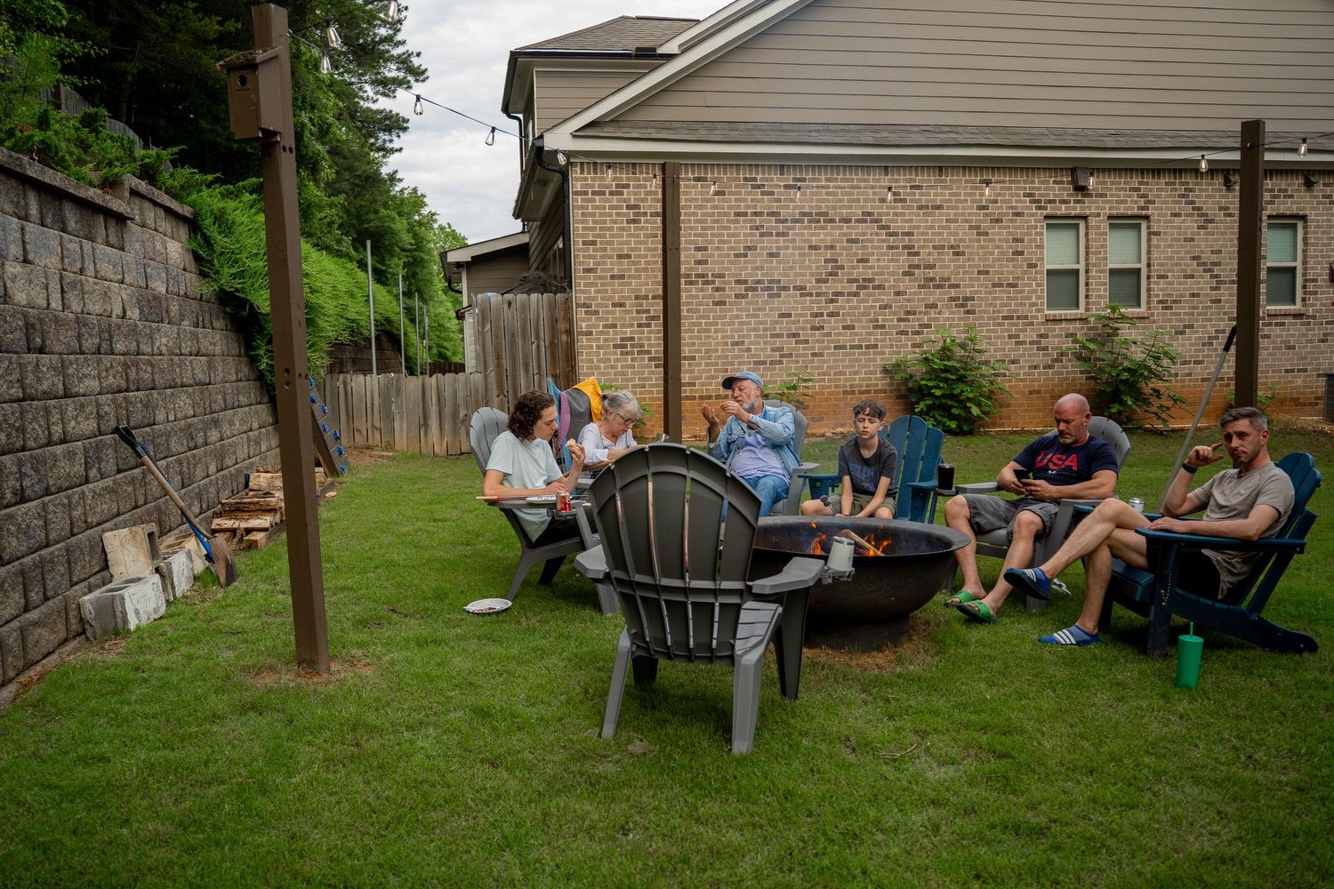 Group sitting round fire