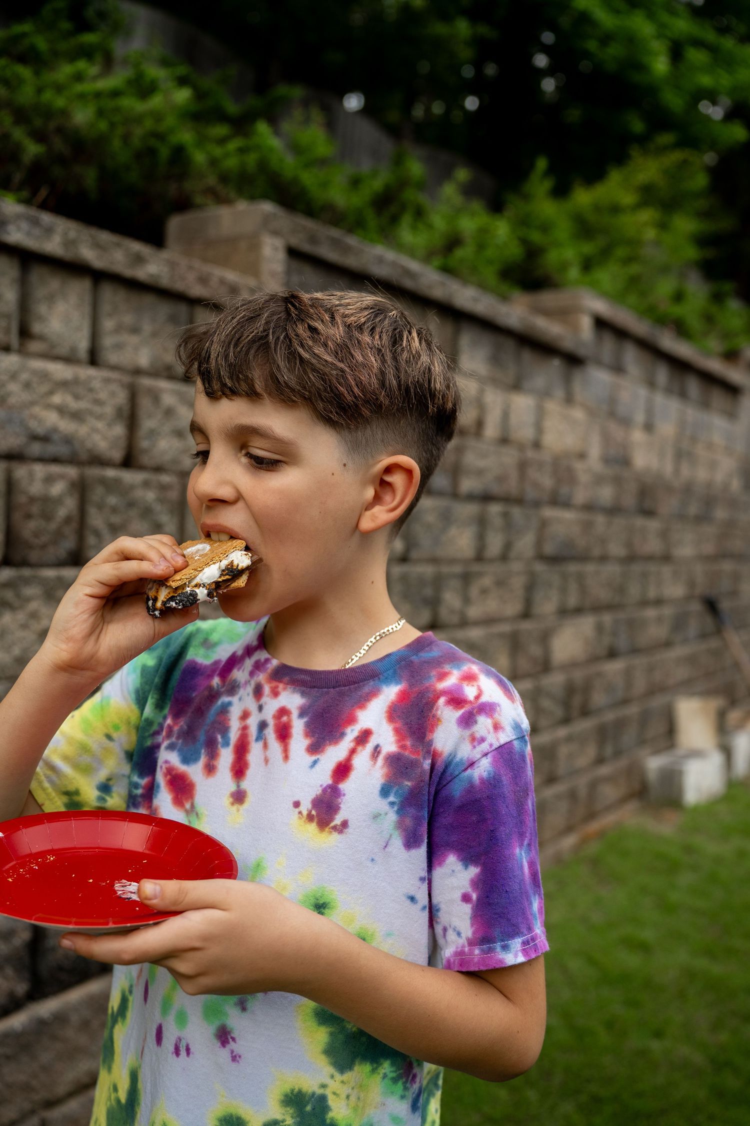 Boy eating s'more