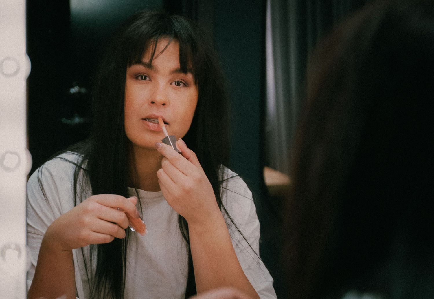 A candid indoor portrait series in warm lighting.
