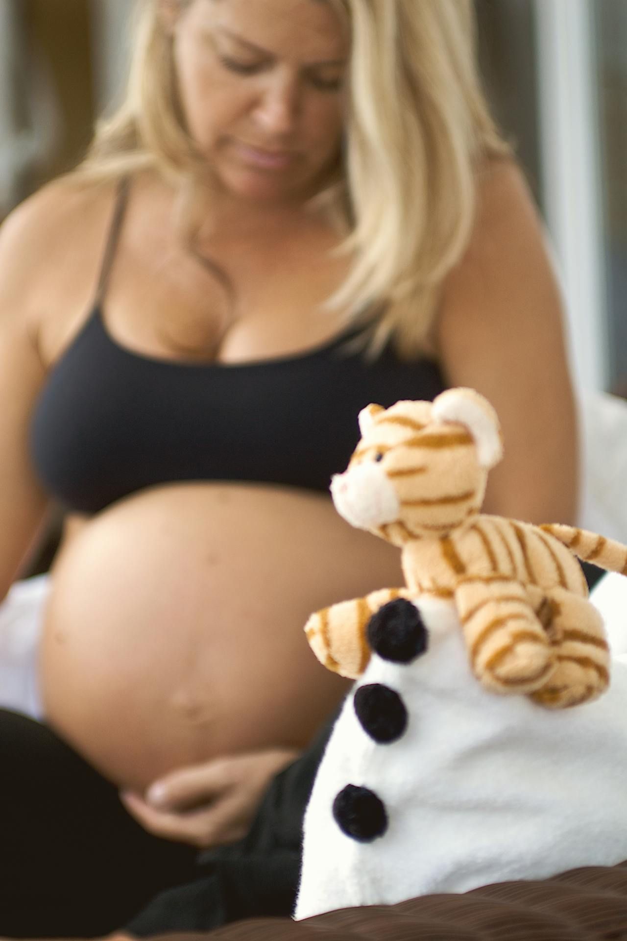 Indoor studio maternity session in Huntsville AL.