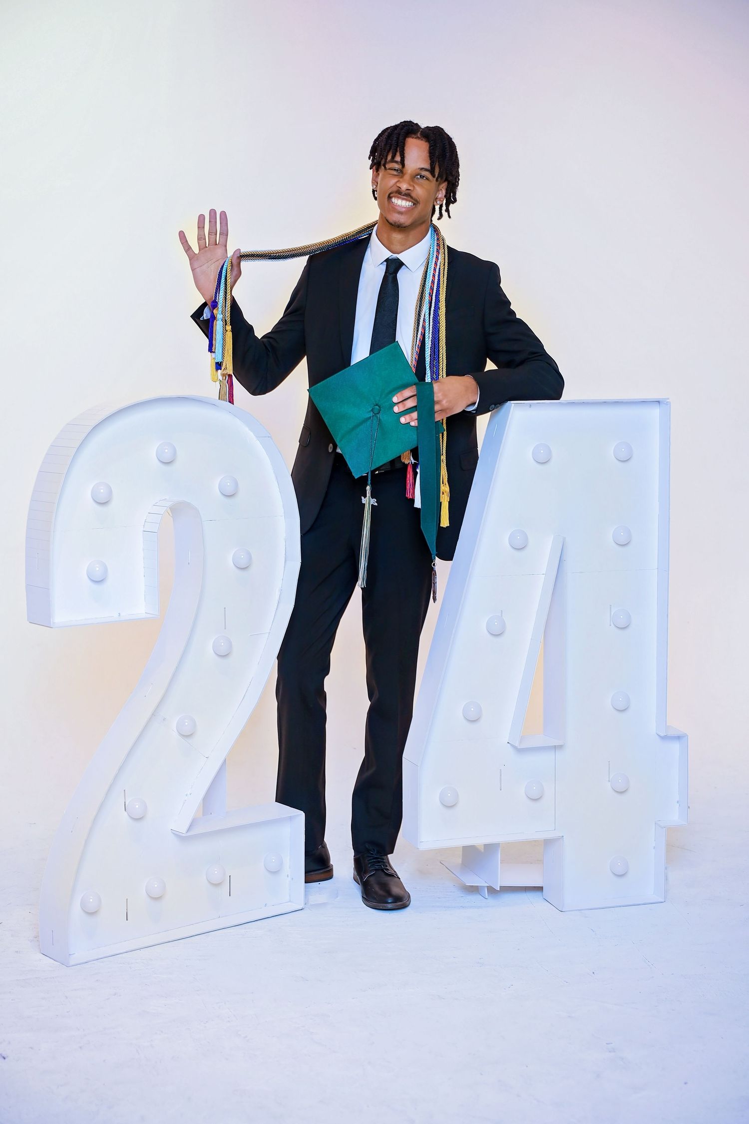 DFW senior graduation photography by Studio Mari — bright joyful high school graduate portrait Forney TX serving Mesquite Garland Arlington