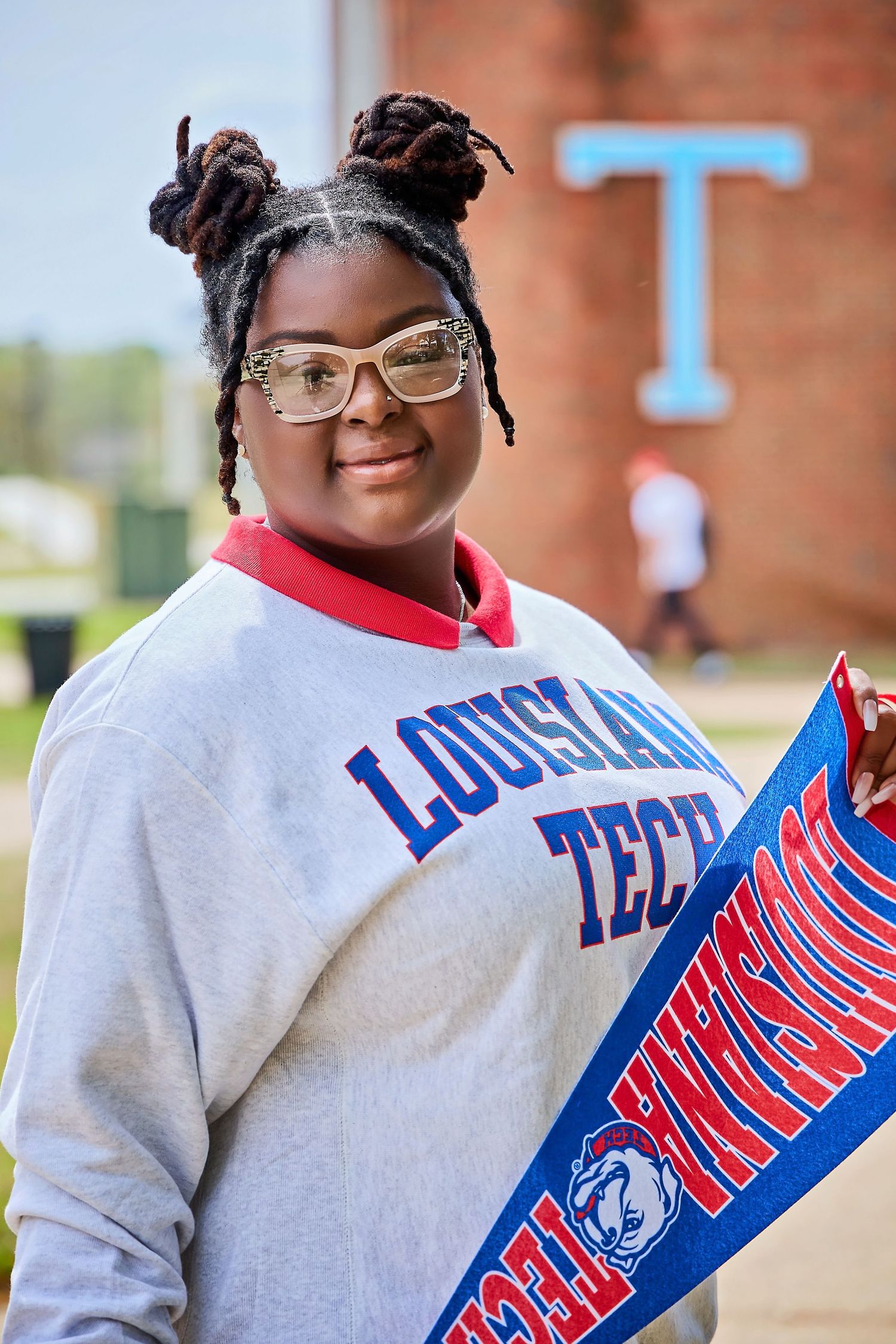 DFW milestone graduation session by Studio Mari — bright vibrant editorial cap gown portrait, Forney TX photographer Mari Jaxn Studio