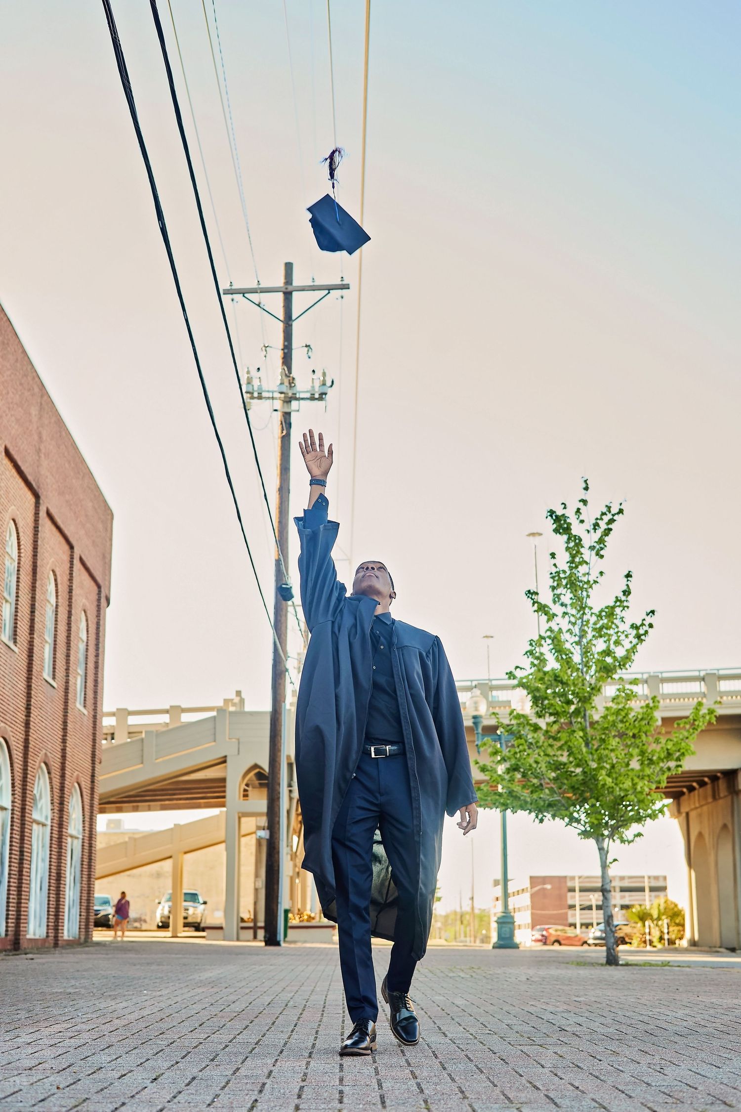 DFW milestone graduation session by Studio Mari — bright vibrant editorial cap gown portrait, Forney TX photographer Mari Jaxn Studio