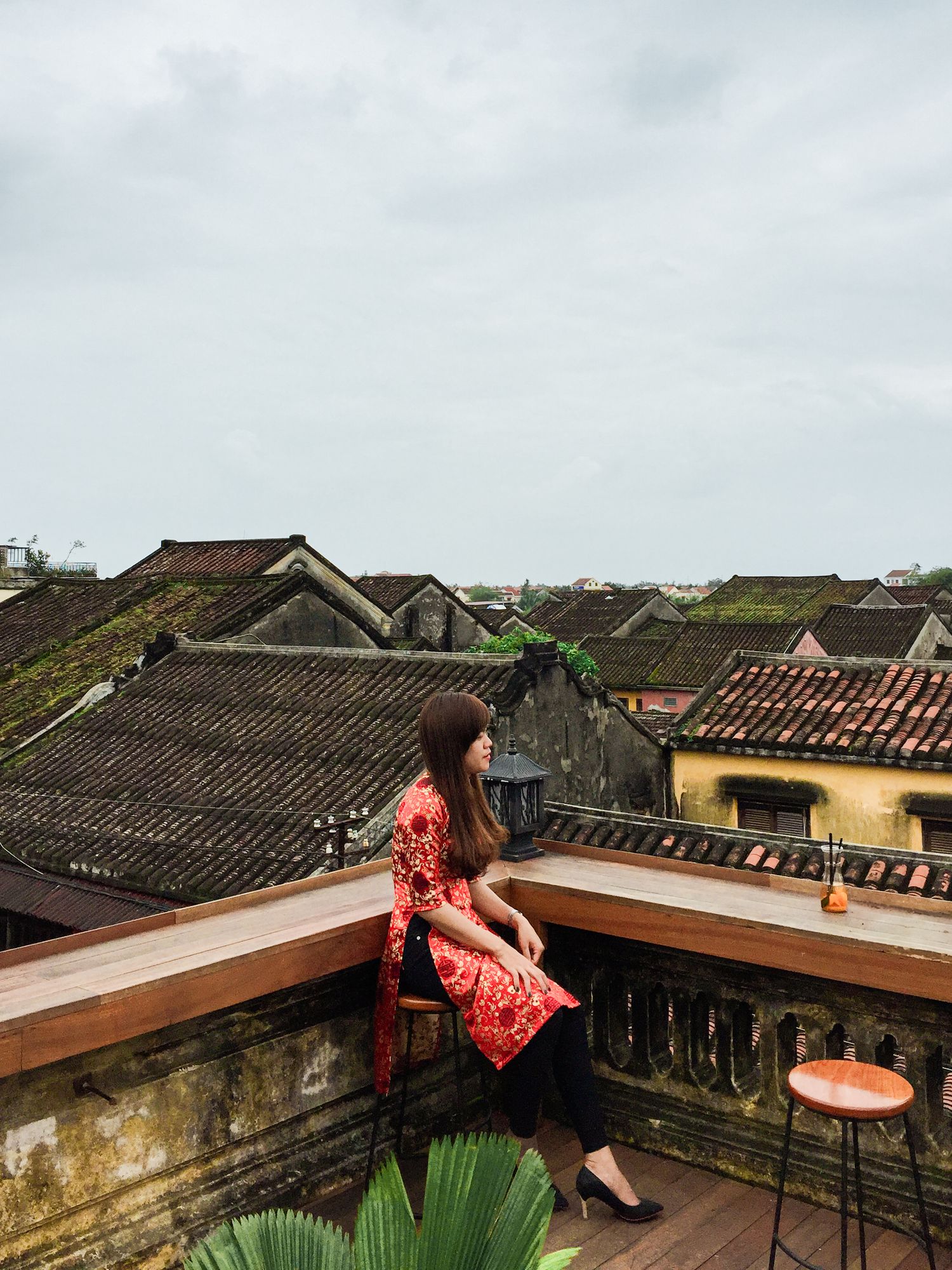 View over traditional tiled rooftops in an ancient Asian town.