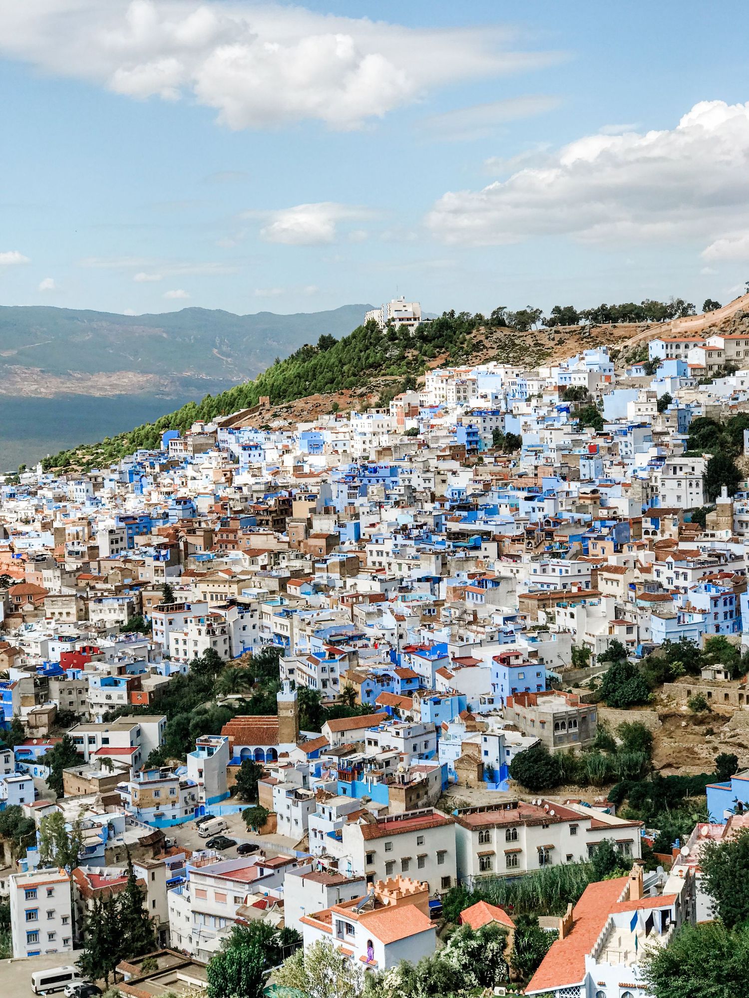 Panoramic view of the blue city of Chefchaouen nestled in Morocco's Rif Mountains.