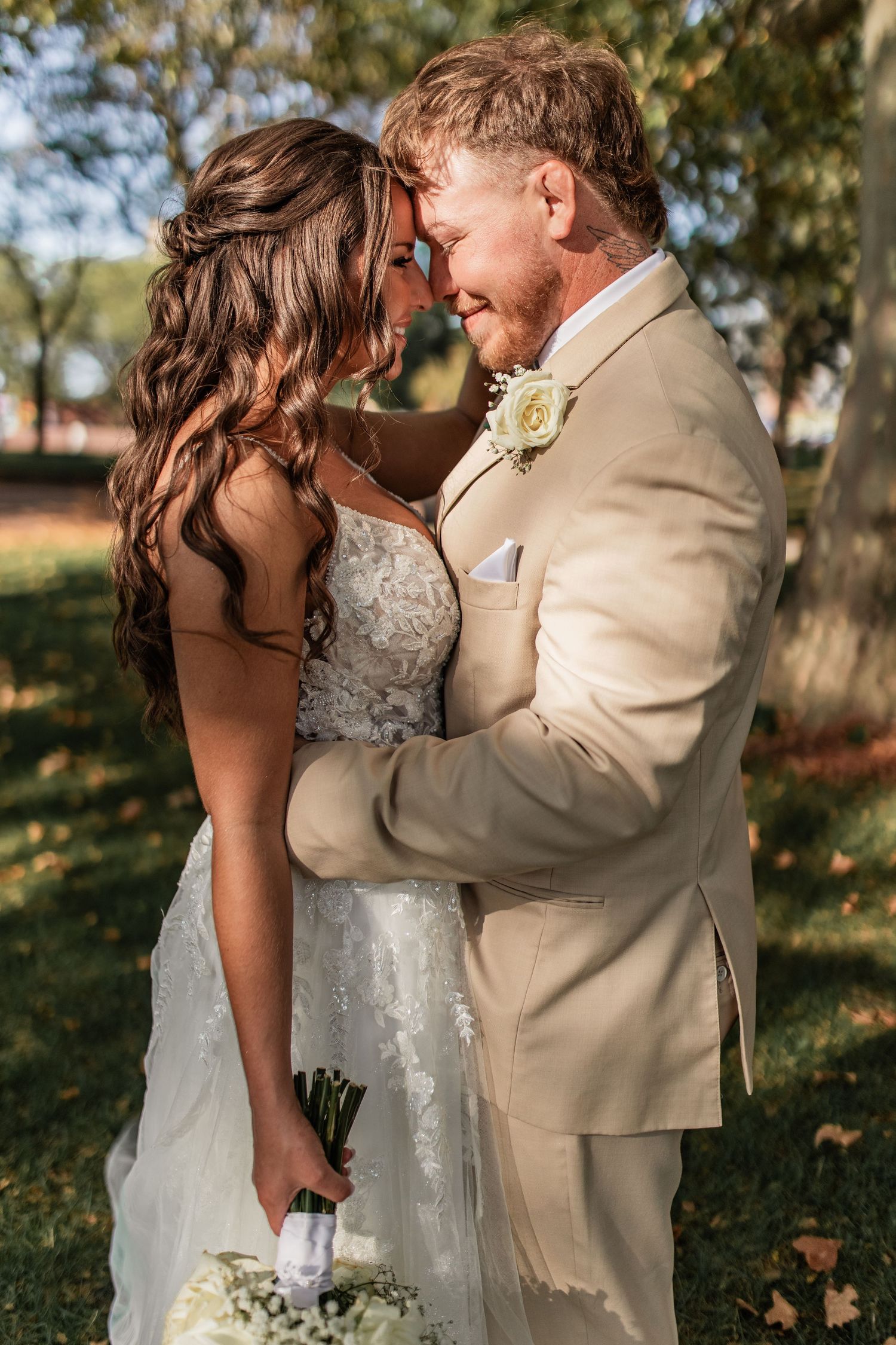 Bride and groom sunset portraits at double tree hilton in Bay City, by local Michigan wedding photgrapher