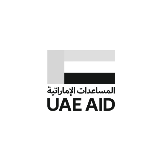 UAE Aid logo featuring the UAE flag emblem in grayscale with Arabic text and bold UAE AID lettering below.
