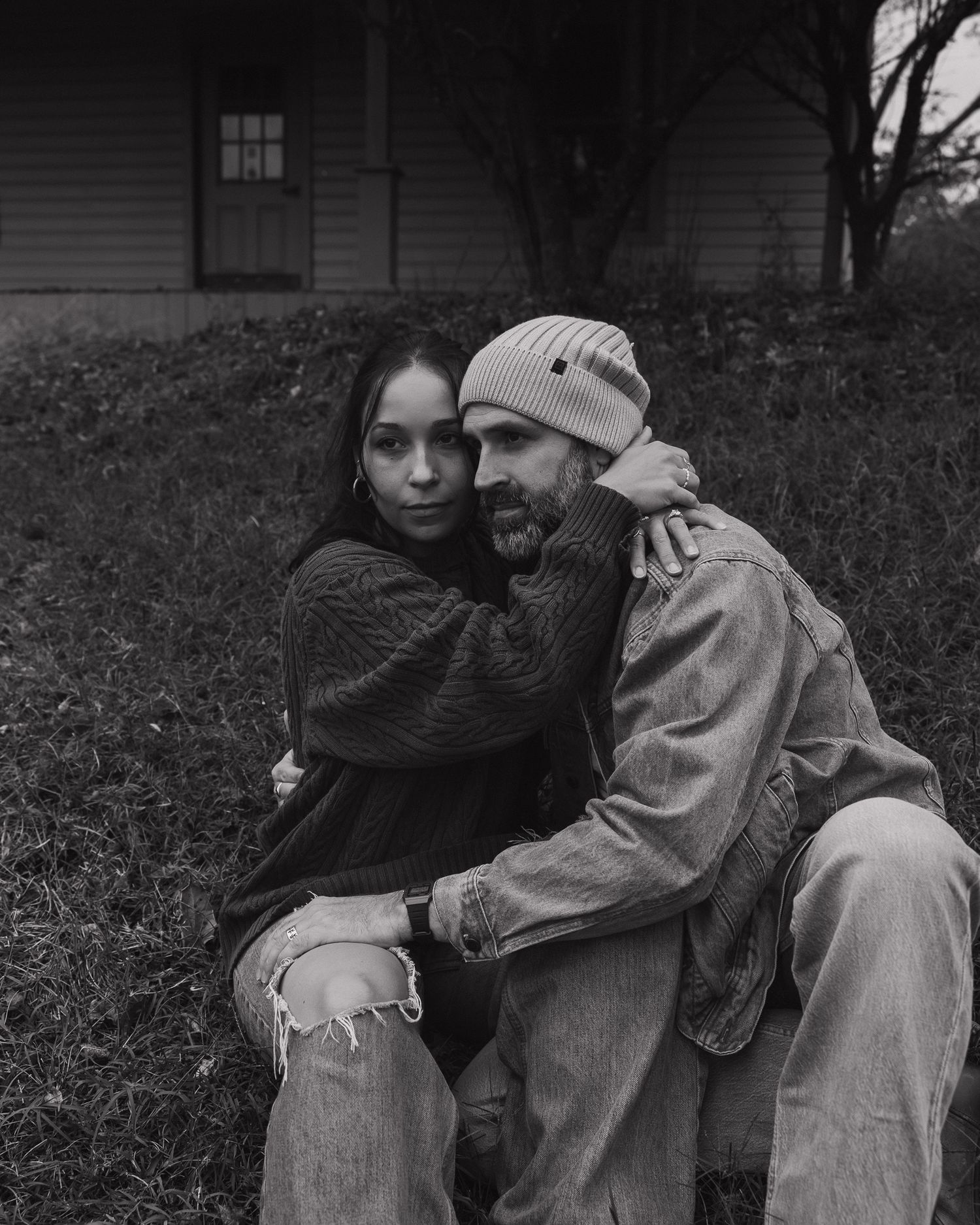 Black and white photo series of intimate moments on a rustic bench.