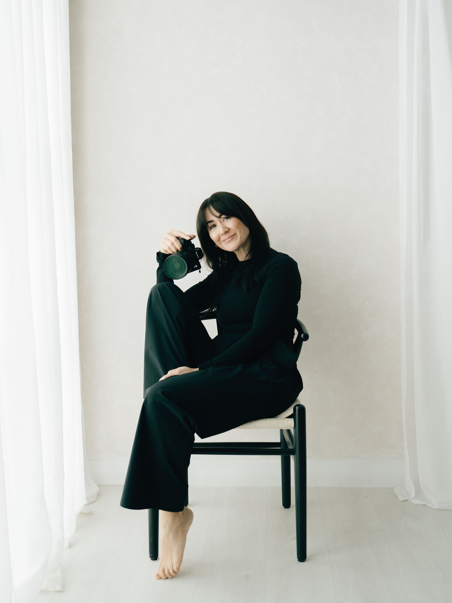 Documentary-style photogrpah of wedding photographer Tina Hevingham at her Manchester based studio. Shoots SONY.