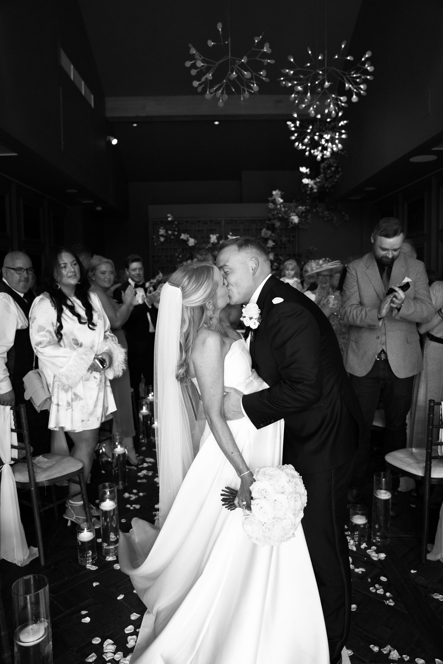 Real wedding moments at Manor House Lindley captured in black and white by  Manchester wedding photographer Tina Hevingham.