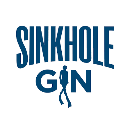 Sinkhole Gin logo featuring bold navy blue text with a silhouette of a person in a diving suit.
