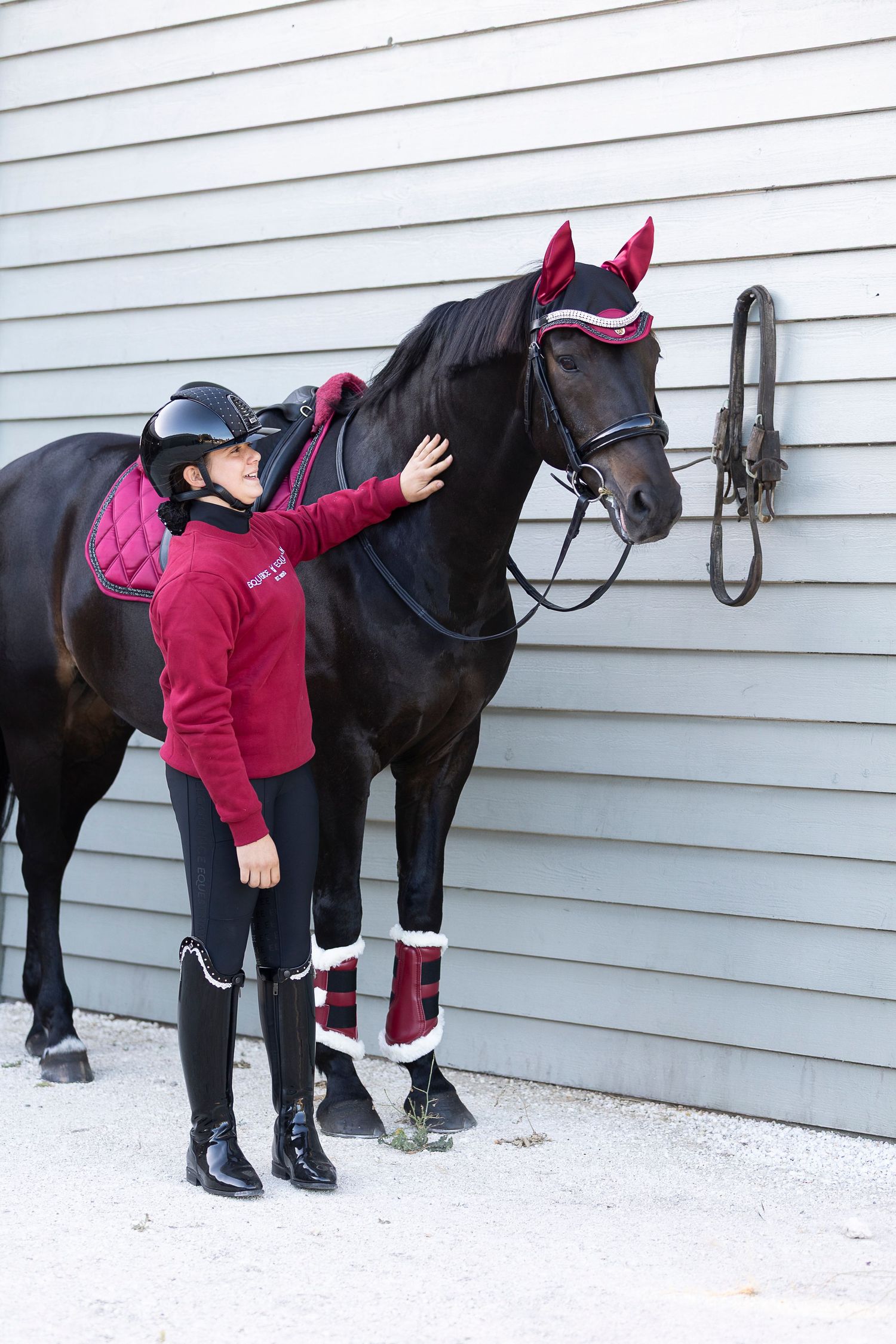 Series of images showing equestrian checking horse's legs and hooves near white building.