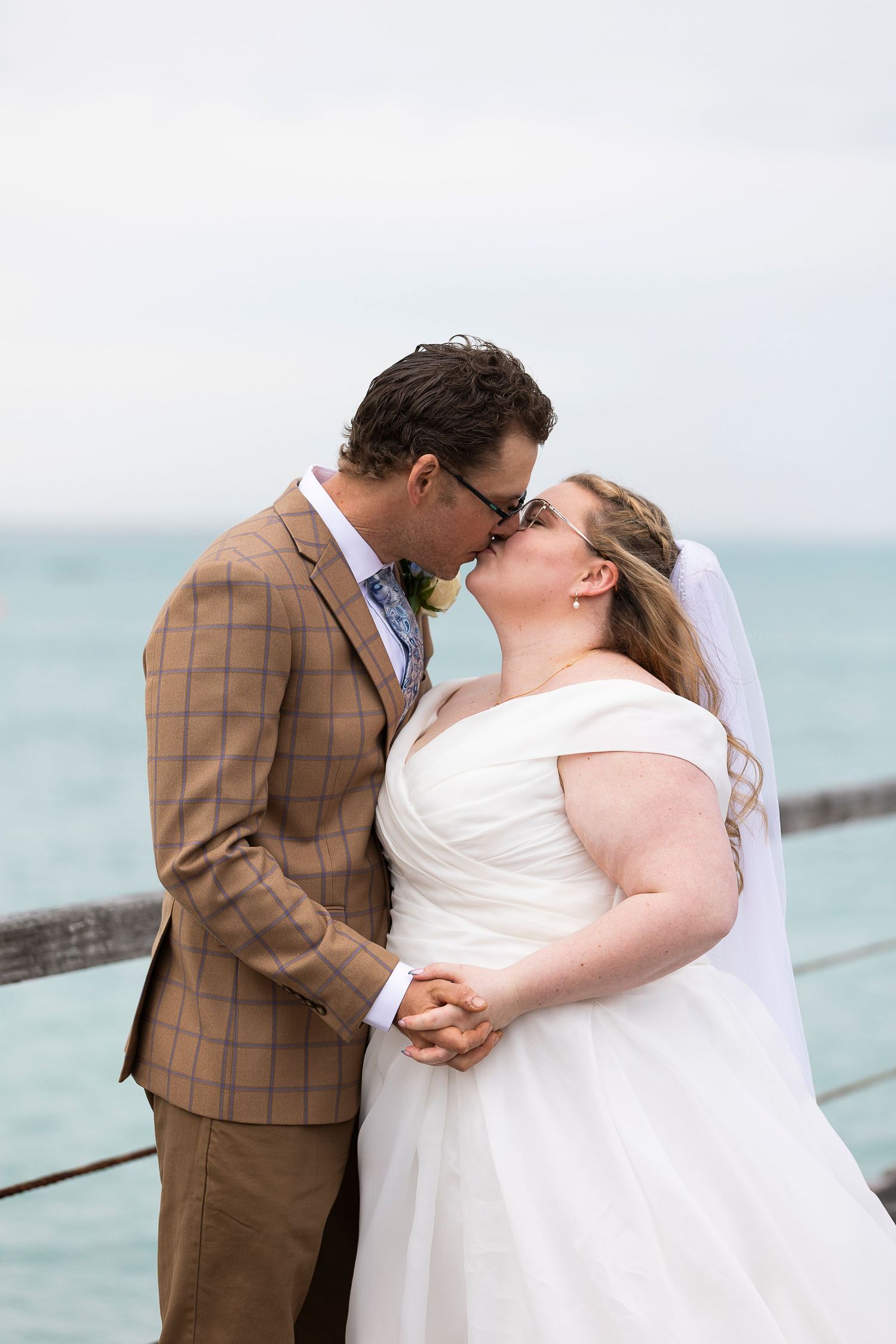 Romantic beach wedding sequence showing couple sharing intimate moments by the ocean.