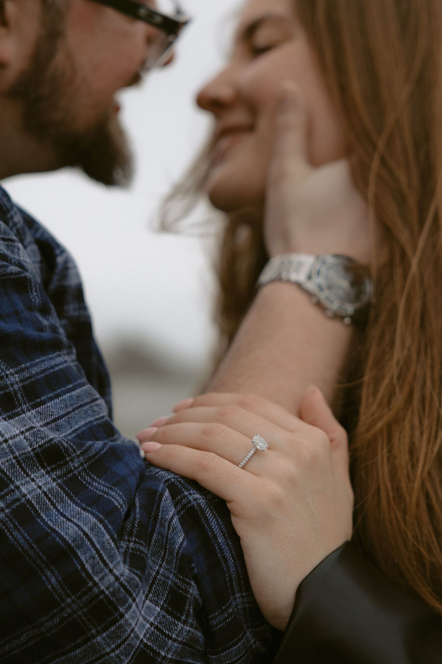 Close-up shot of engaged couple wearing engagement rings on Vancouver Island