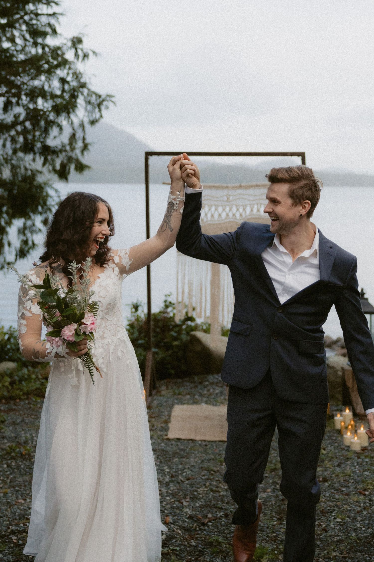 Tofino wedding photograph newlyweds celebrating after ceremony