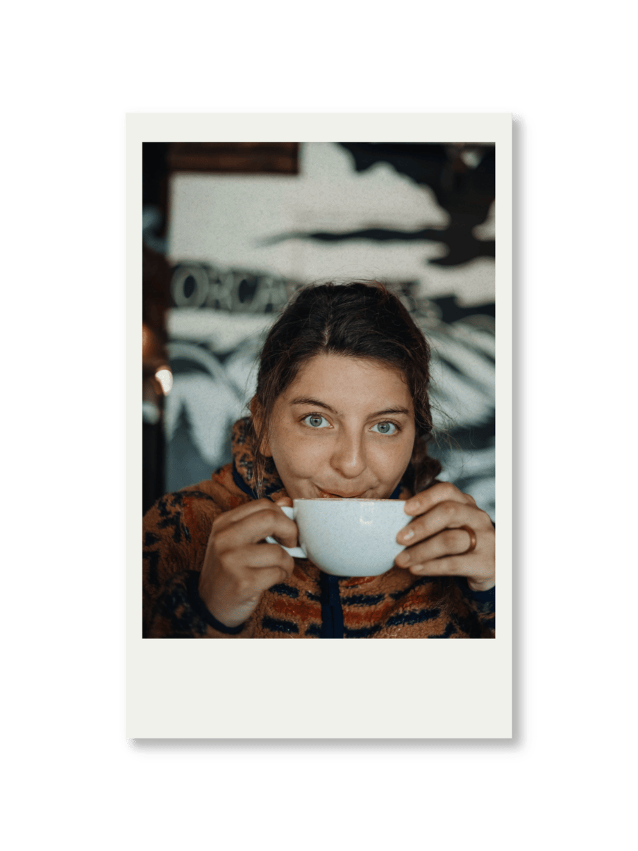 Port Alberni wedding photographer polaroid style photo of person Mariana coffee in orange sweater