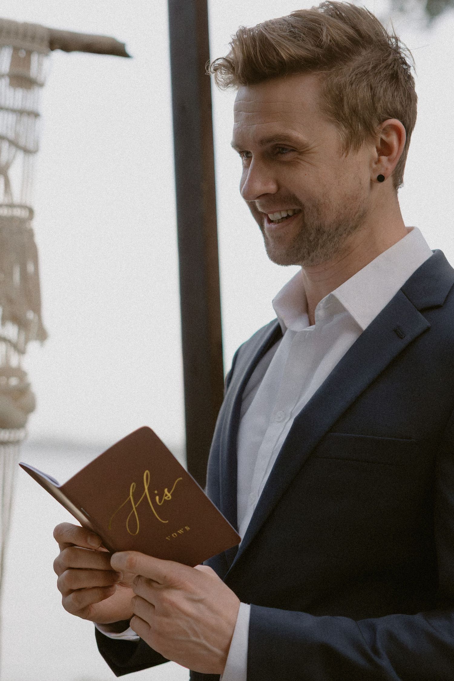 Ucluelet groom reading his wedding vows in Tofino