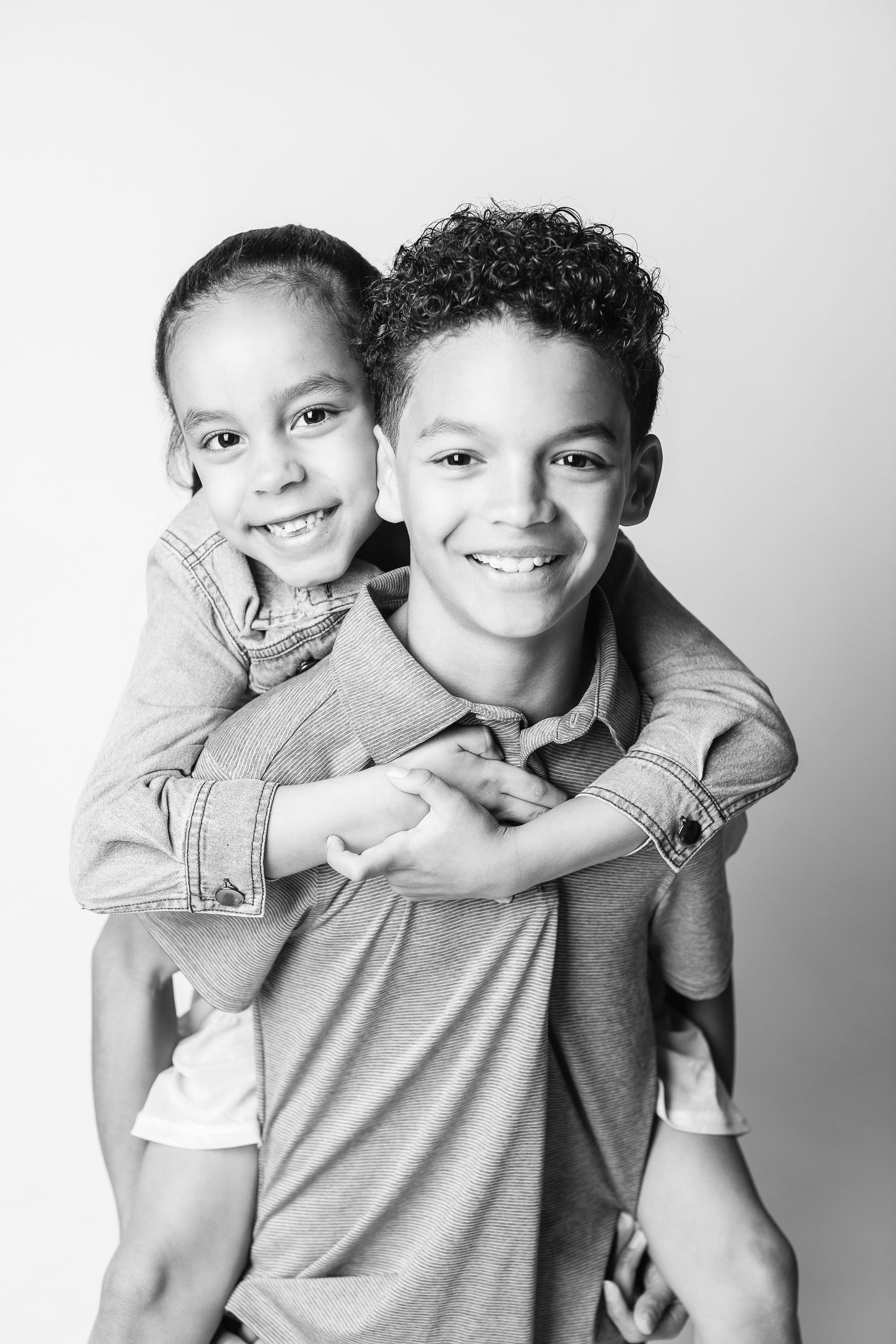 A timeless sibling portrait capturing personality by FRAMED, Northeast Ohio's child photographer.