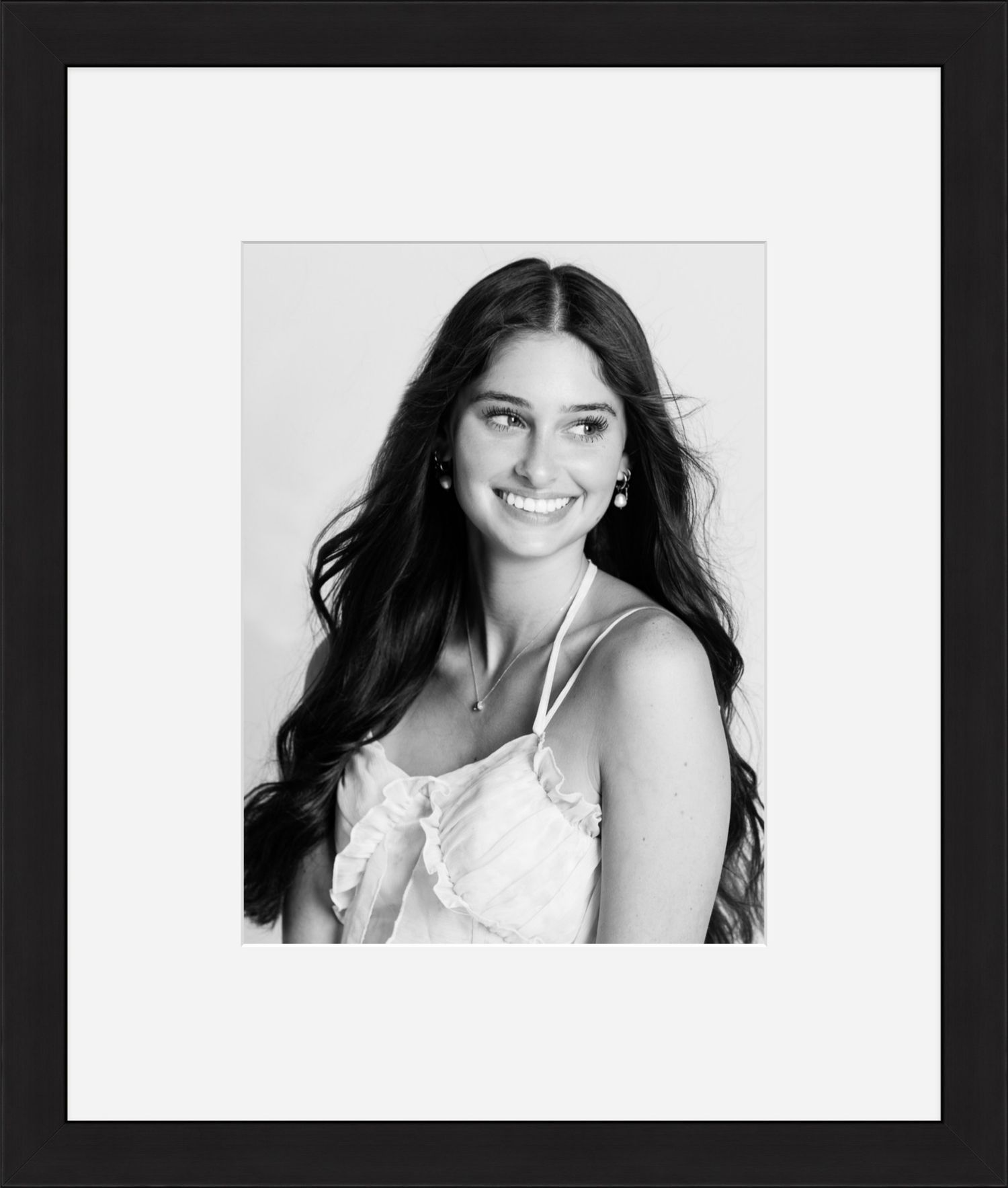 A professionally framed black and white portrait of a teen girl by FRAMED photography in Northeast Ohio.