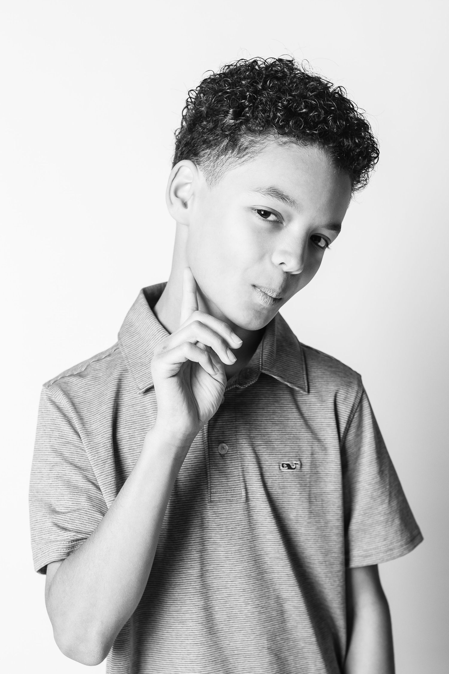 Black and white personality portrait of a boy by FRAMED, Northeast Ohio children's photographer.