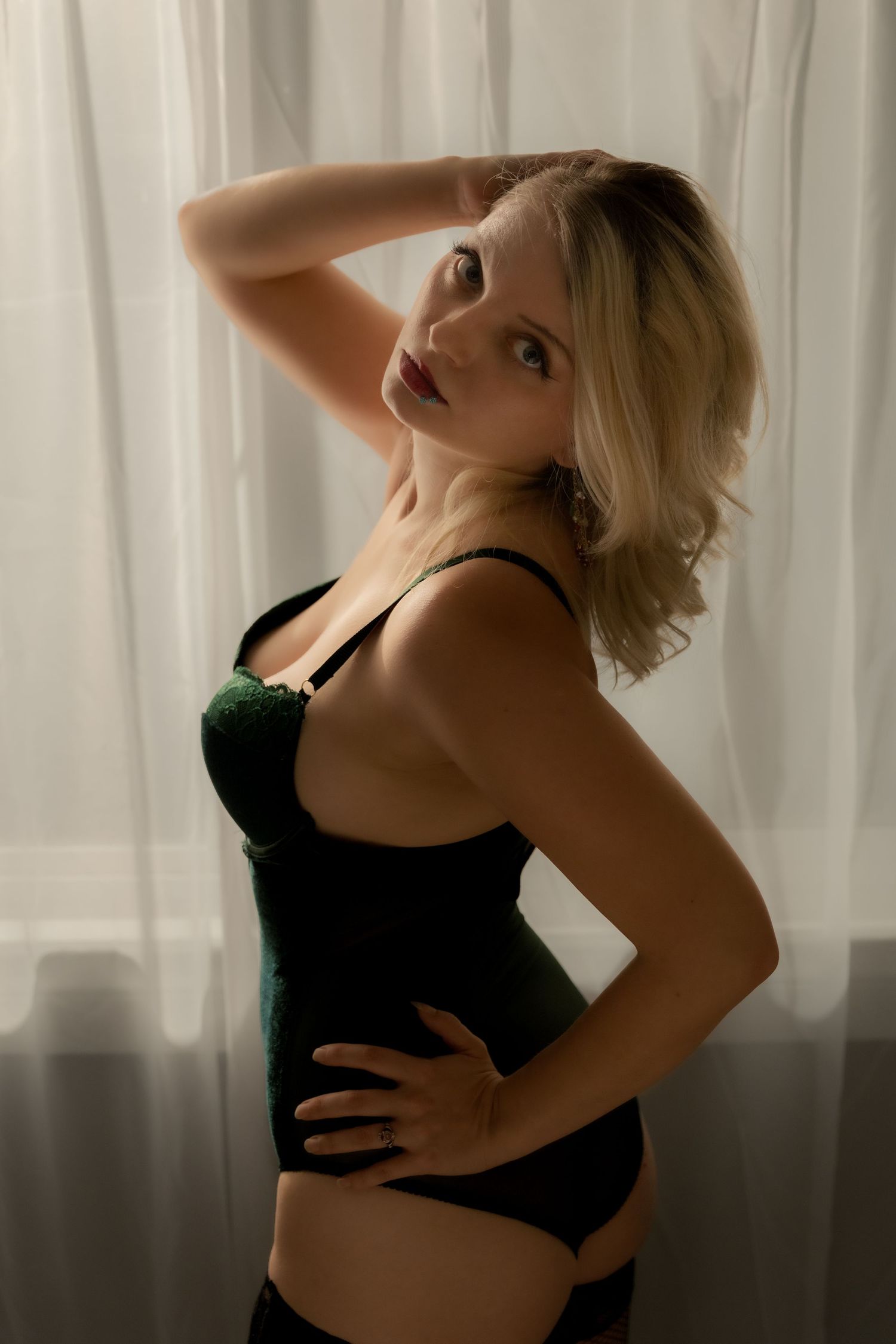 Boudoir portrait by window, Wild Ridge Boudoir Montana