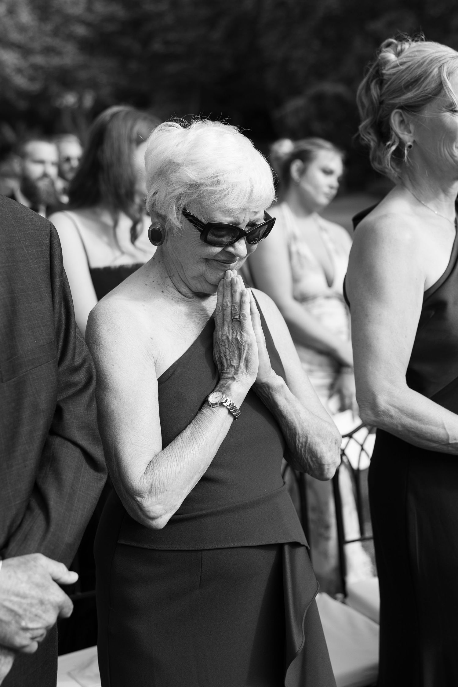 Black and white photo series showing emotional reactions during a wedding ceremony.