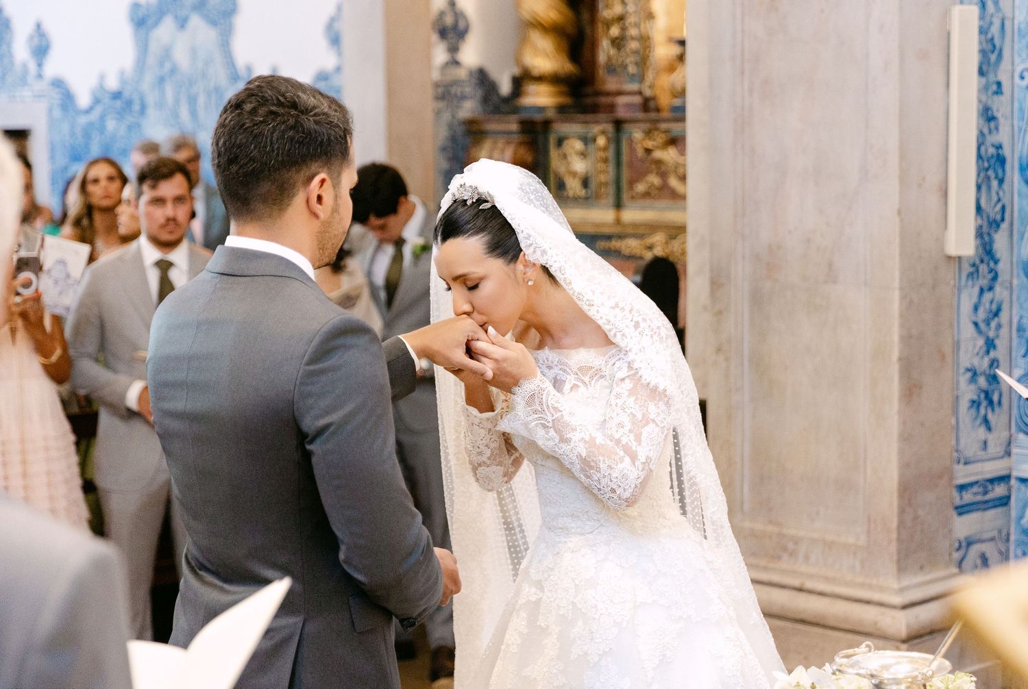 Ornate church interior decorated for an elegant wedding ceremony.