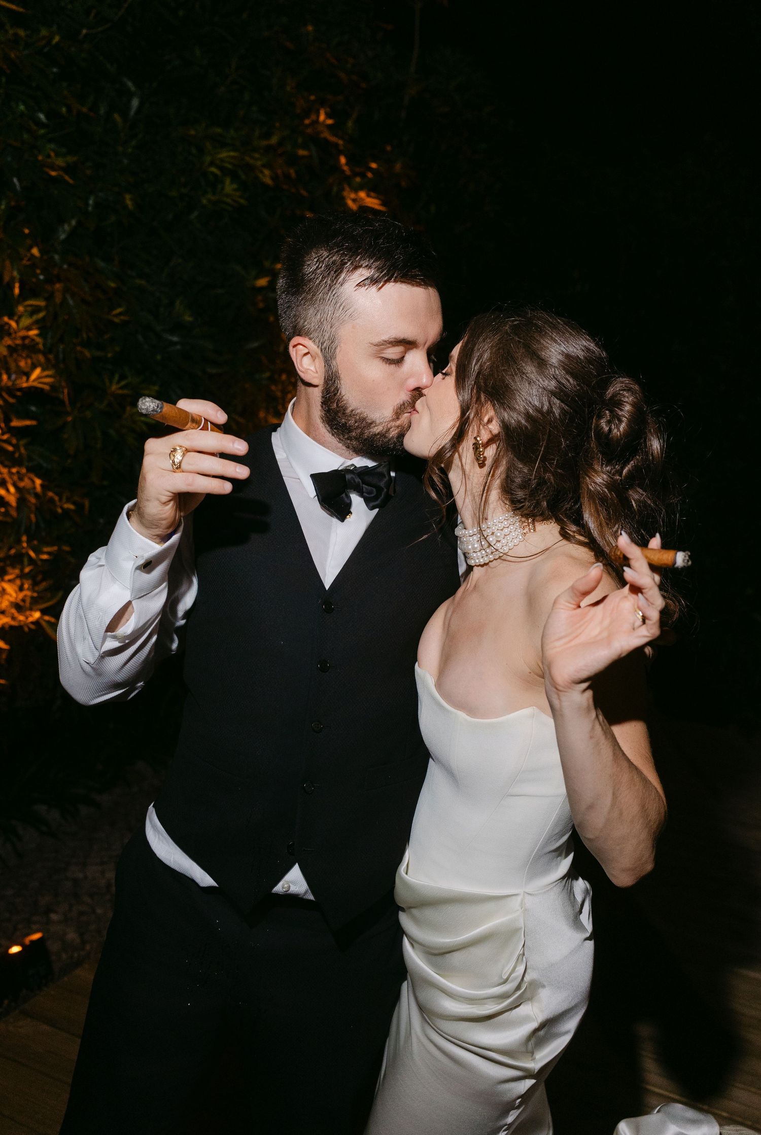 A couple shares an intimate dance moment at their wedding reception.
