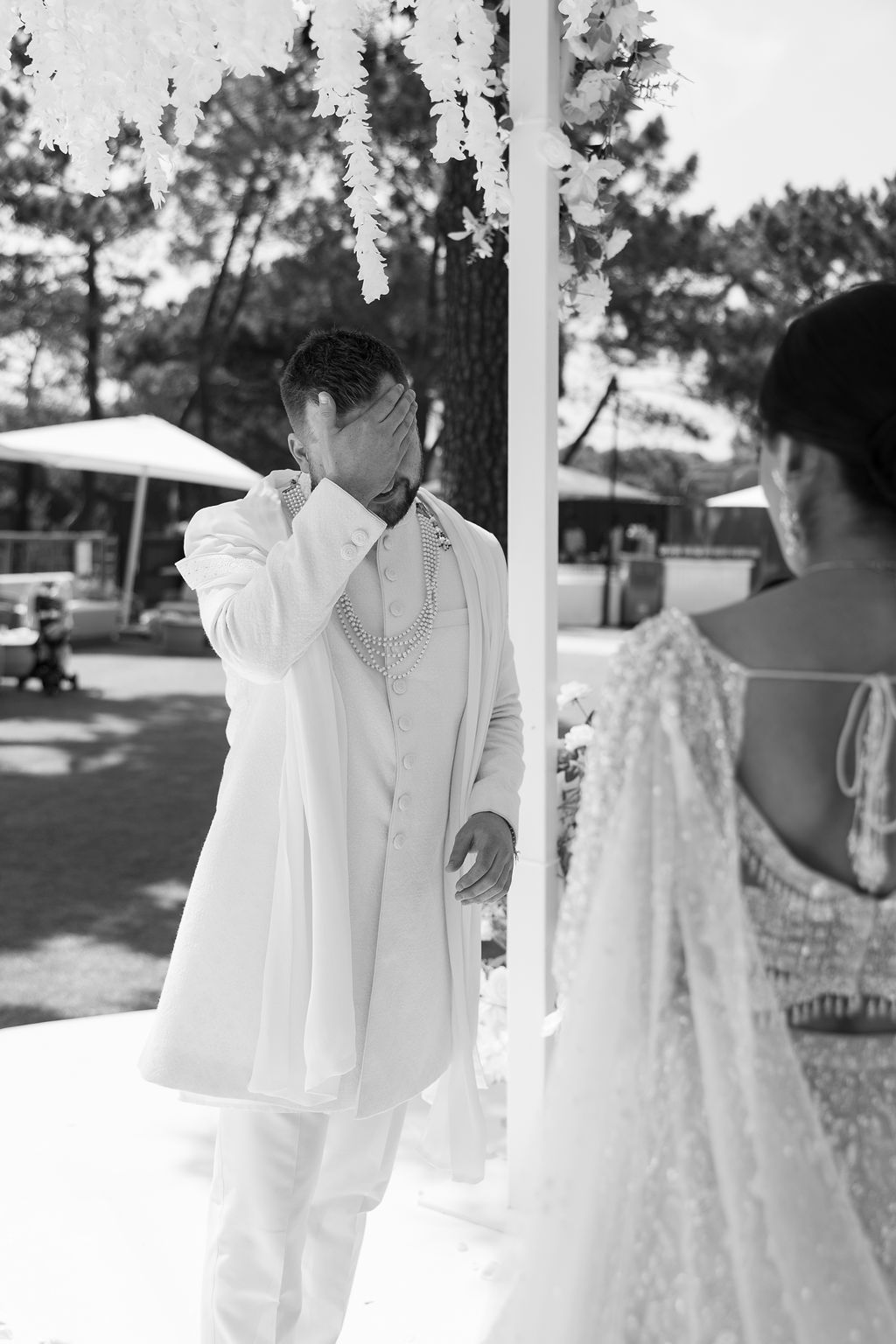 Black and white photos capture romantic dance moments between newlyweds at an outdoor venue.