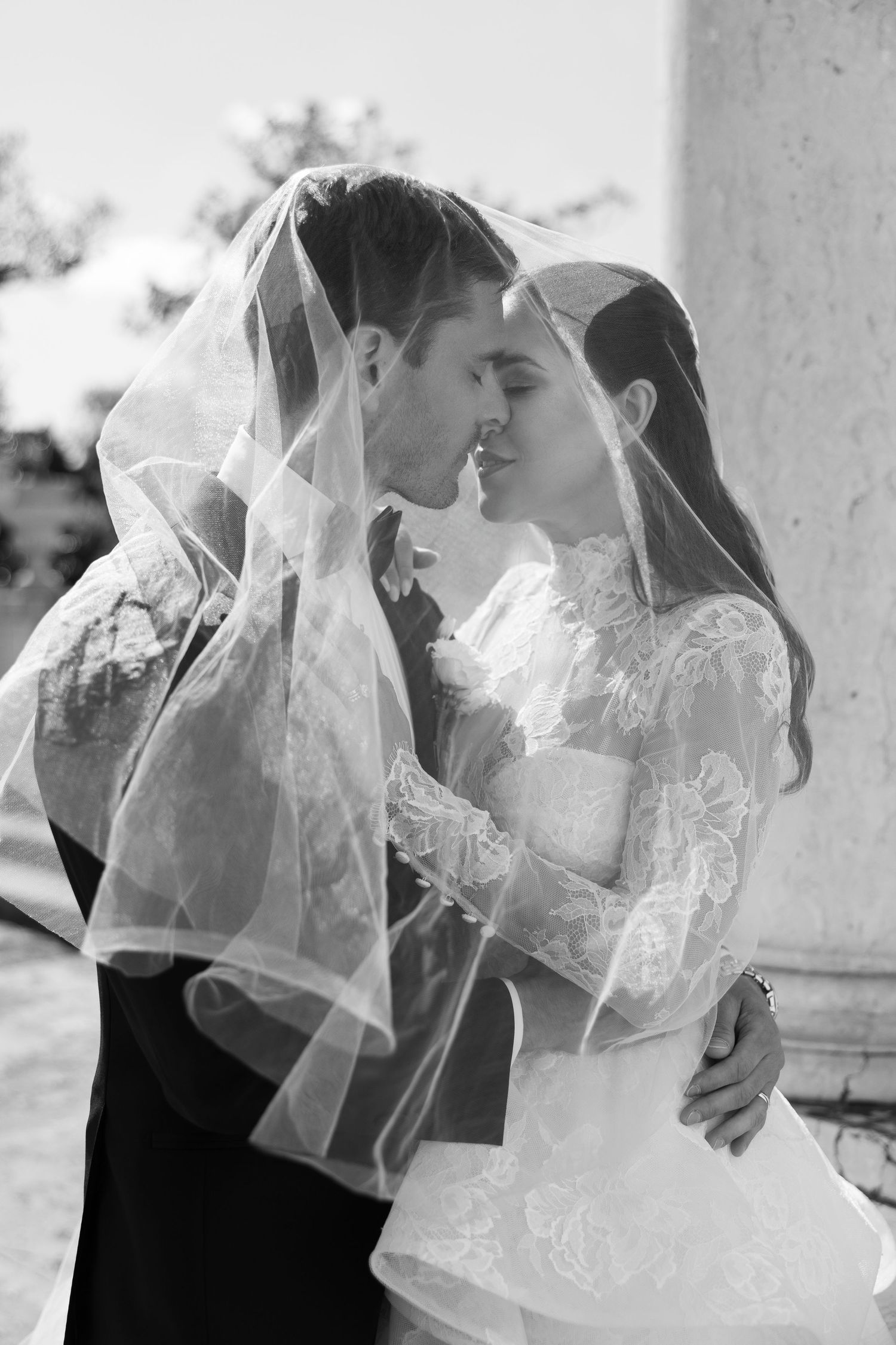 Series of romantic moments through delicate wedding veil.